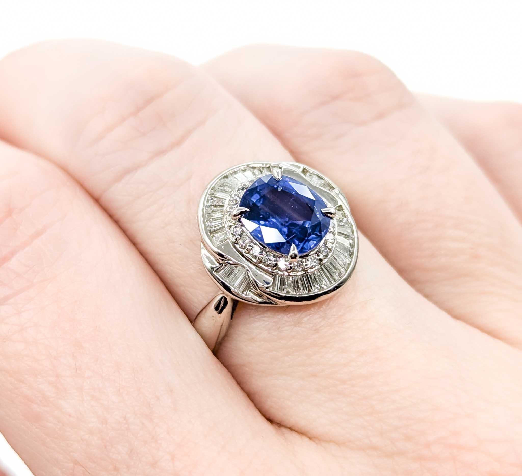 Oval Cut Sapphire and Diamond Ring in Platinum