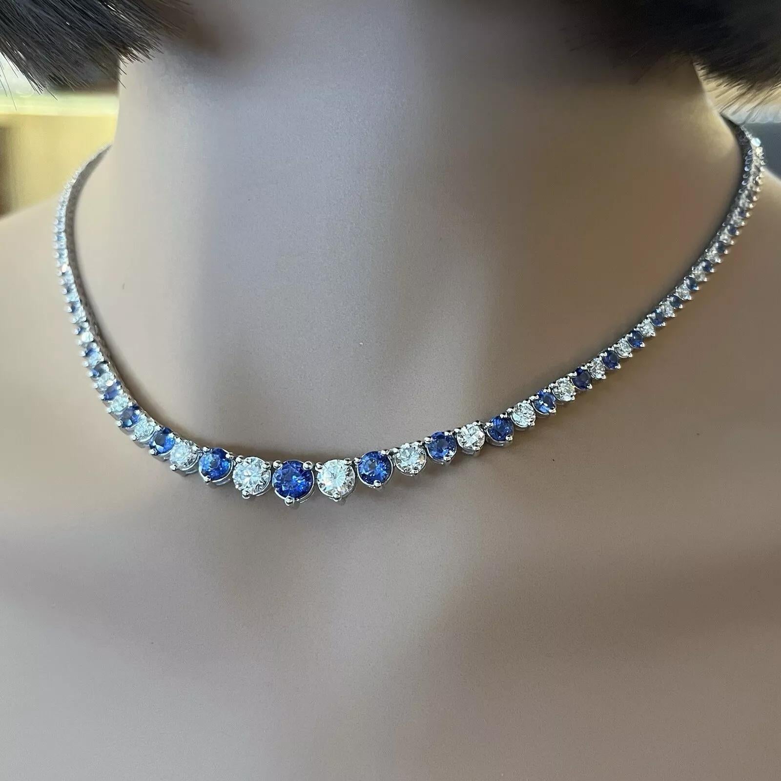 Sapphire and Diamond Riviera Tennis Necklace in 18k White Gold

Sapphire and Diamond Necklace features Graduating Natural Round Faceted Sapphires and Natural Round Faceted Diamonds, all 3 prong set in 18k White Gold. The necklace is secured by a box