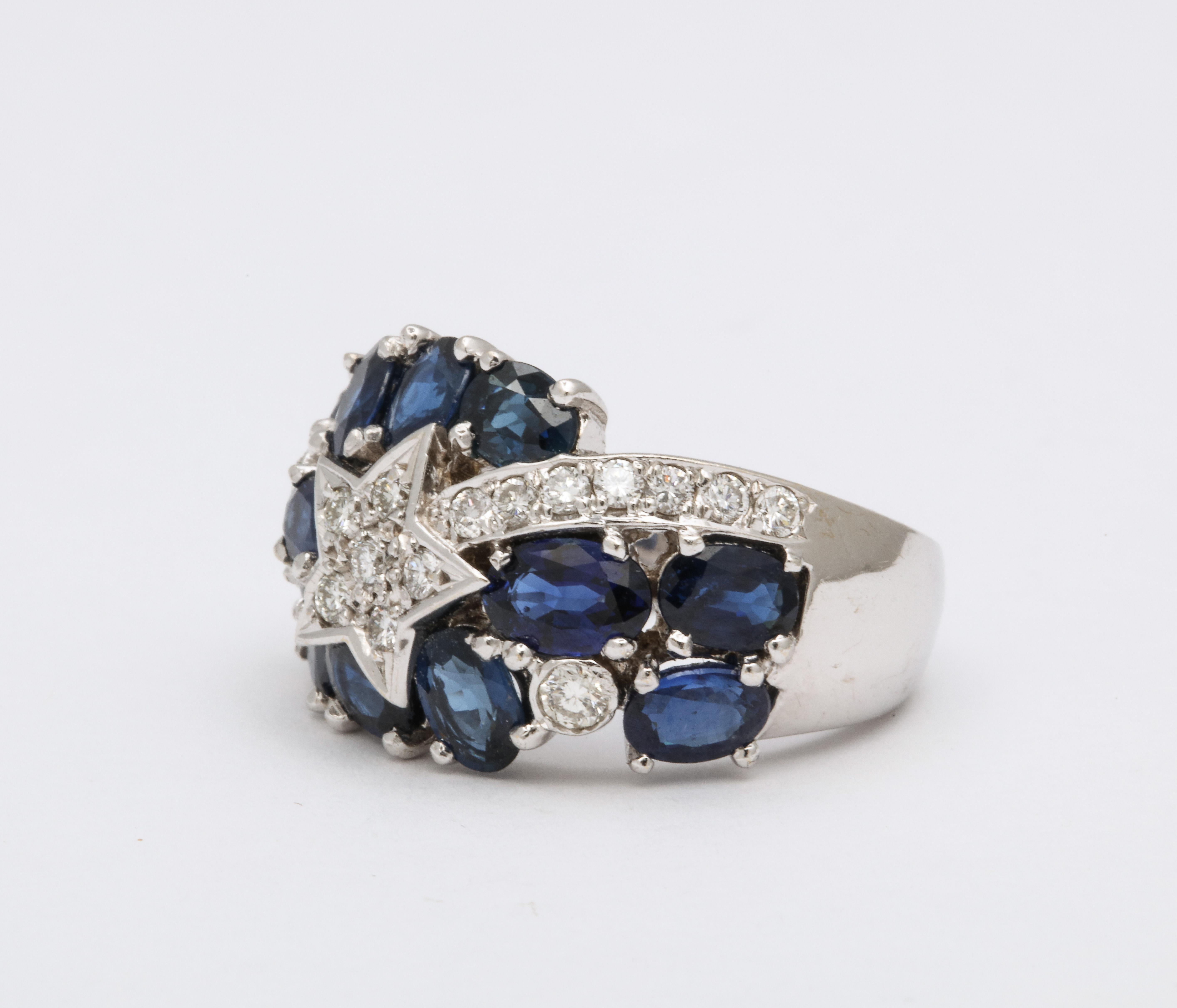 
A special and unique ring.

4.83 carats of blue sapphire 

.40 carats of white round brilliant cut diamonds 

18k white gold

Over 14mm wide

Currently a size 6.5, this ring can easily be resized. 