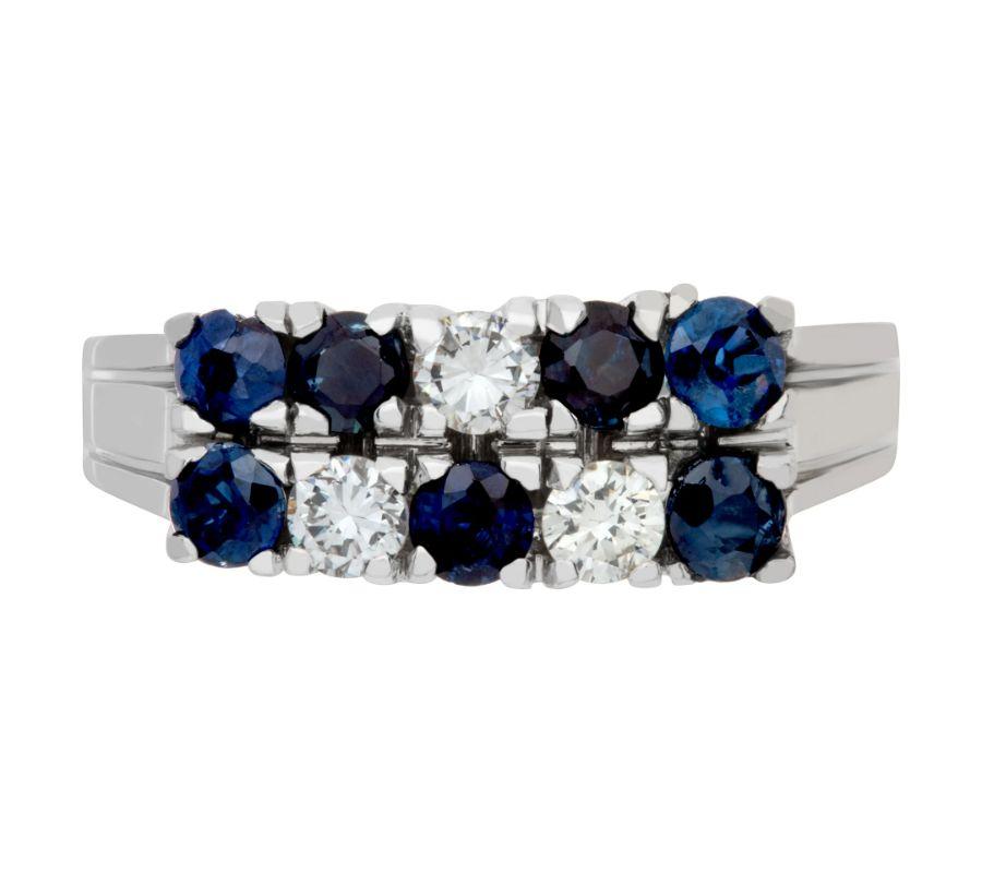 Sapphire and diamond station ring in 14k white gold with approximately 0.20 carats in diamonds and 0.40 carats in sapphires. Size 9This Diamond/Sapphires ring is currently size 9 and some items can be sized up or down, please ask! It weighs 3.2