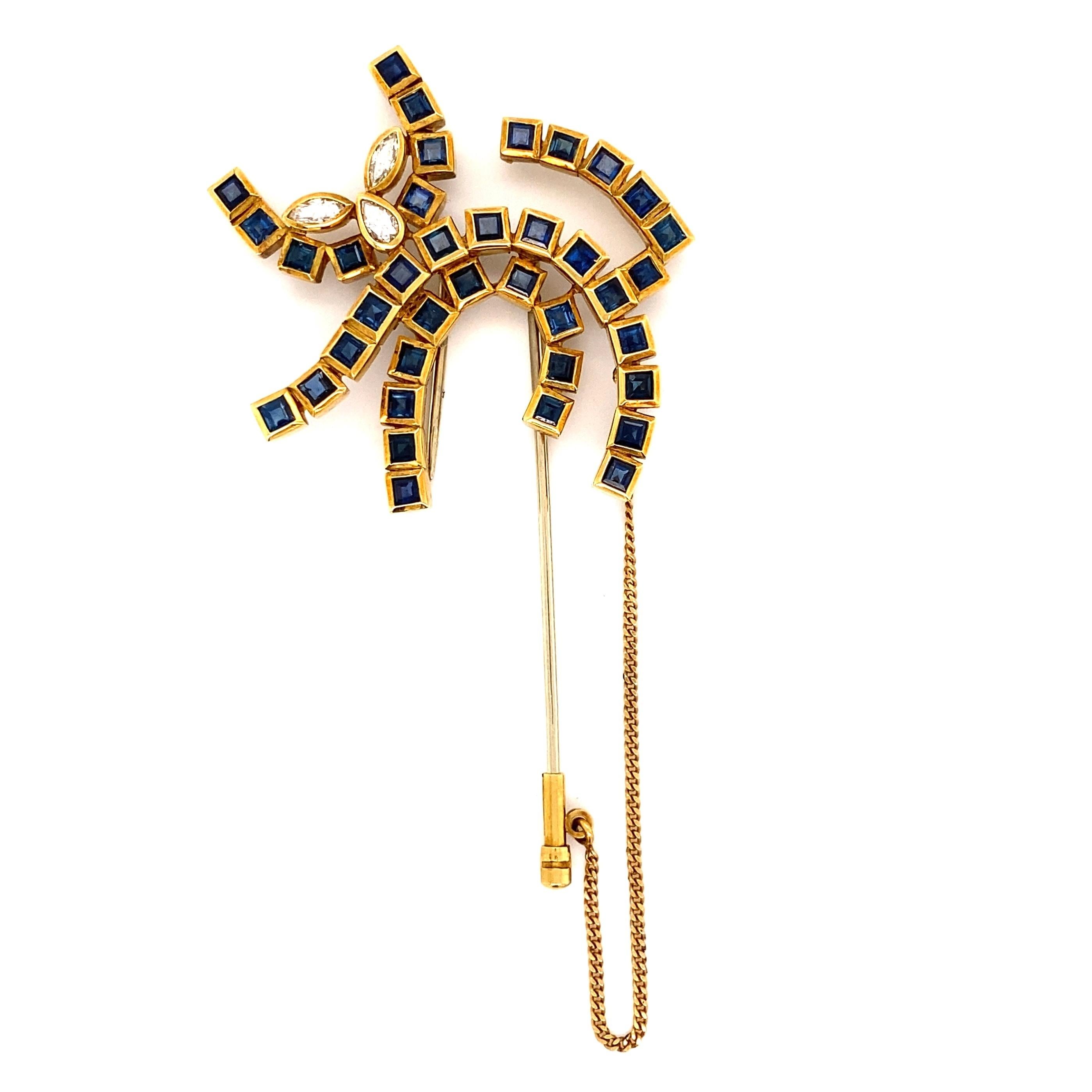 Simply Awesome! Sapphire and Diamond Stylized Cat Brooch Pin. Hand set with Sapphires, weighing approx. 6.90tcw and Diamonds approx. 0.25tcw. Beautifully Hand crafted in 18K Yellow Gold. Measuring approx. 3.00” long x 1.75” wide. In excellent