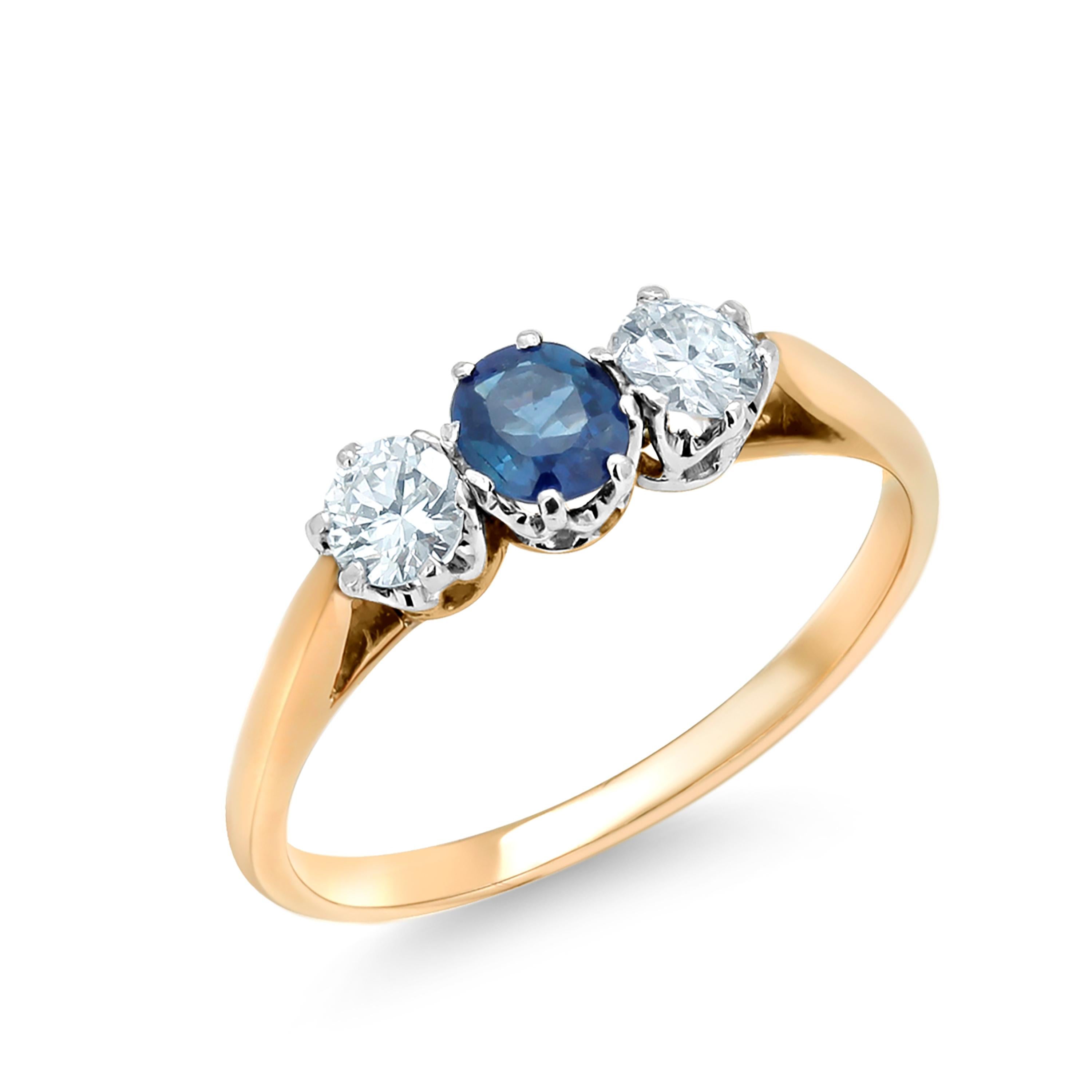 Sapphire and Diamond Three Stone Eighteen Karat Gold Ring In Good Condition In New York, NY