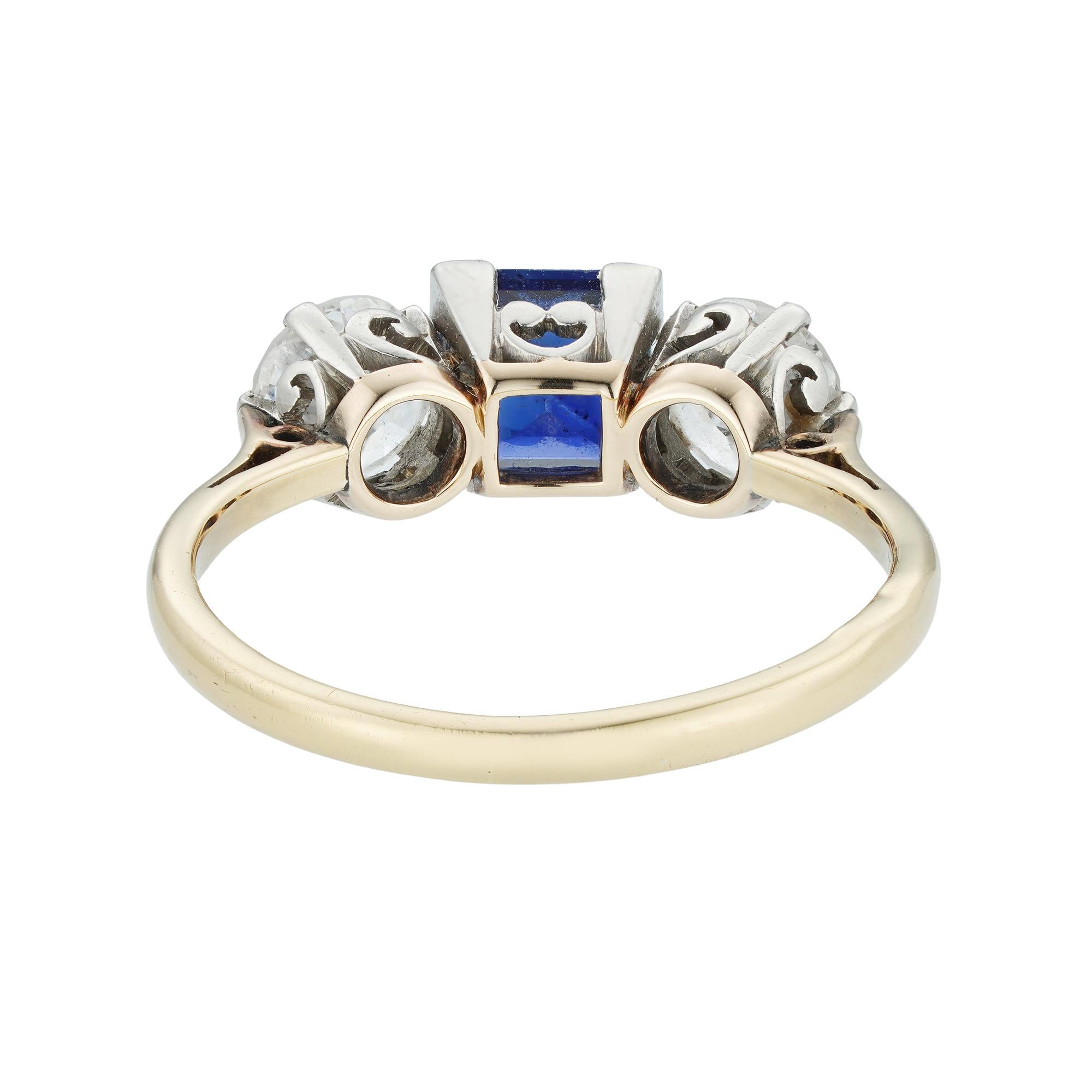Modern Sapphire and Diamond Three-Stone Ring