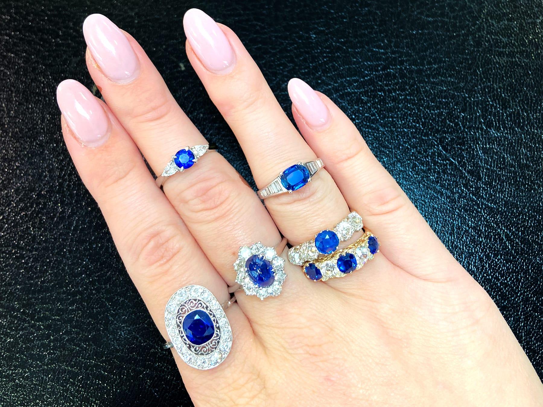 A stunning, fine and impressive antique 0.57 carat sapphire and 0.32 carat diamond, platinum trilogy ring; part of our diverse antique jewelry and estate jewelry collections.

This fine and impressive antique sapphire and diamond ring has been