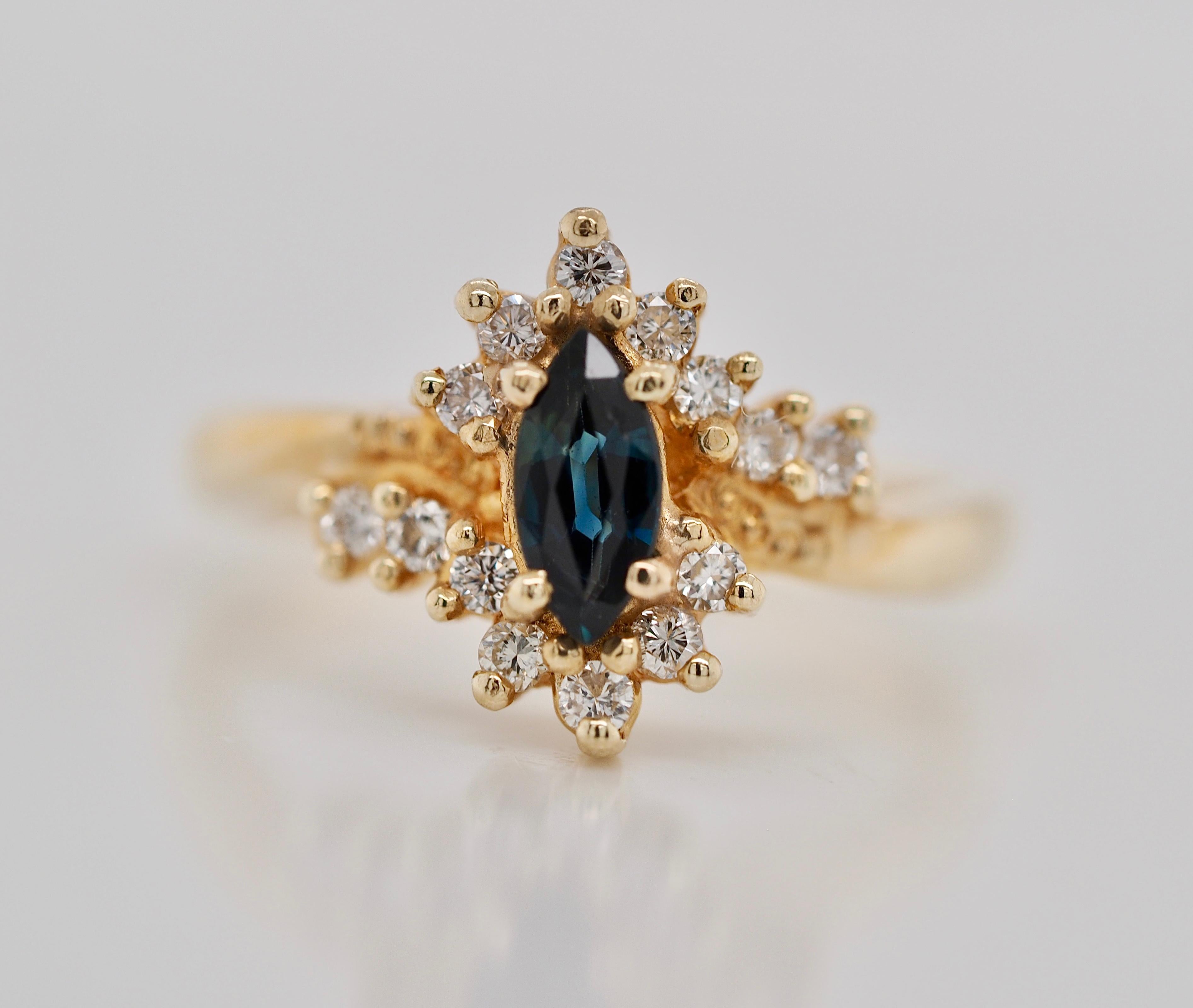 A retro ring is always the perfect accessory. This bright blue marquise sapphire is accented with a starburst of brilliant round diamonds. It is such a precious ring you can layer or wear on its own bringing so much life!
It can be sized up or