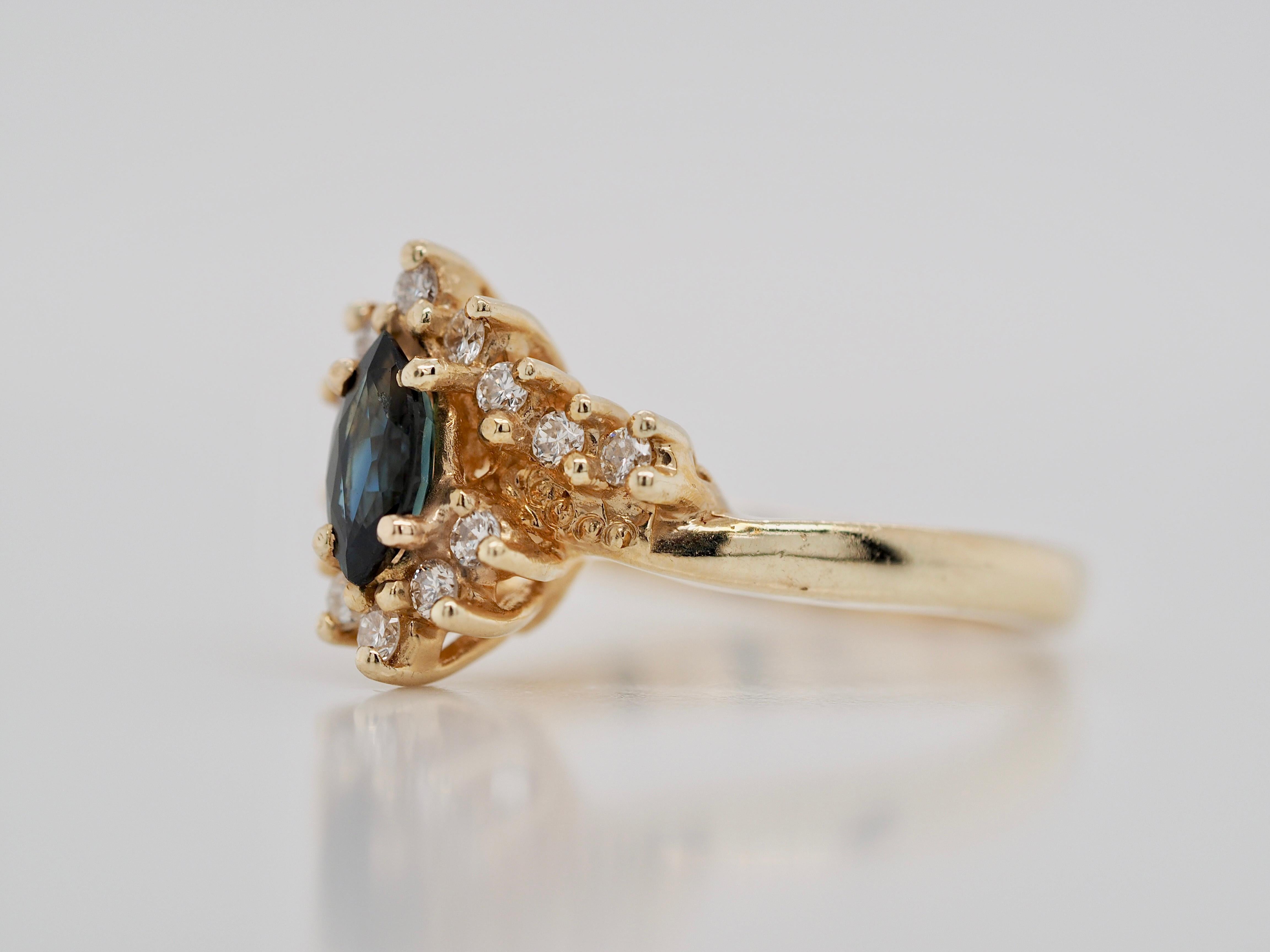 Marquise Cut Sapphire and Diamond Vintage Marquise Ring in 14 Karat Yellow Gold For Sale