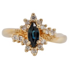 Sapphire and Diamond Retro Marquise Ring in 14 Karat Yellow Gold