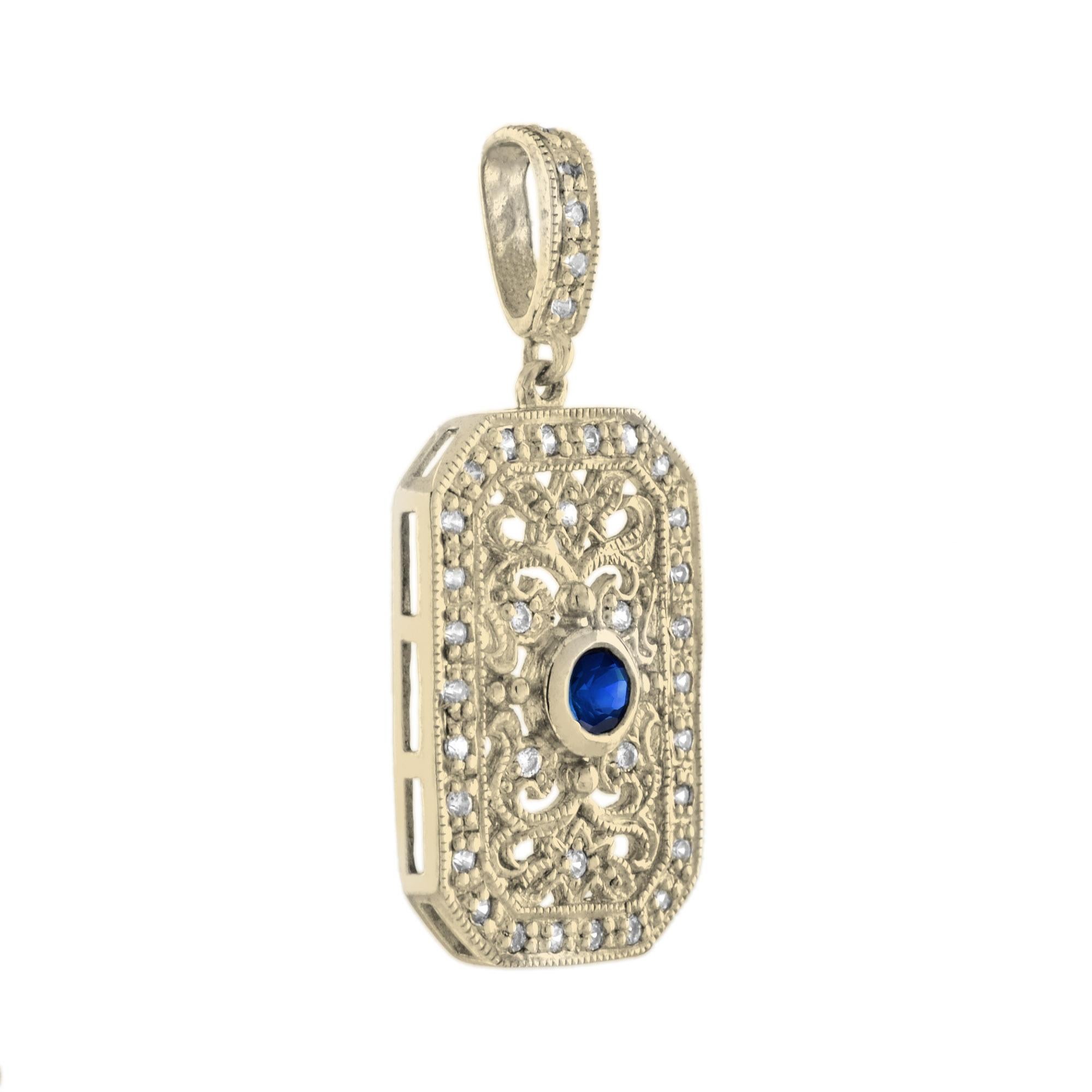 Featuring a 0.09 carat blue sapphire at the center and an ornate, vintage inspired design, this pendant is fit for any outfit. The colorful center stone is accented by sparkling round cut white diamonds that total 0.19 carats set on a 14k yellow