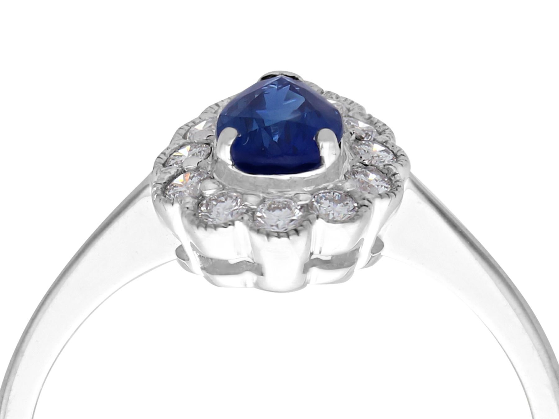 A fine and impressive contemporary 0.68 carat blue sapphire and 0.39 carat diamond, 18 karat white gold dress ring; part of our diverse contemporary jewelry collections.

This fine and impressive pear cut sapphire and diamond ring has been crafted
