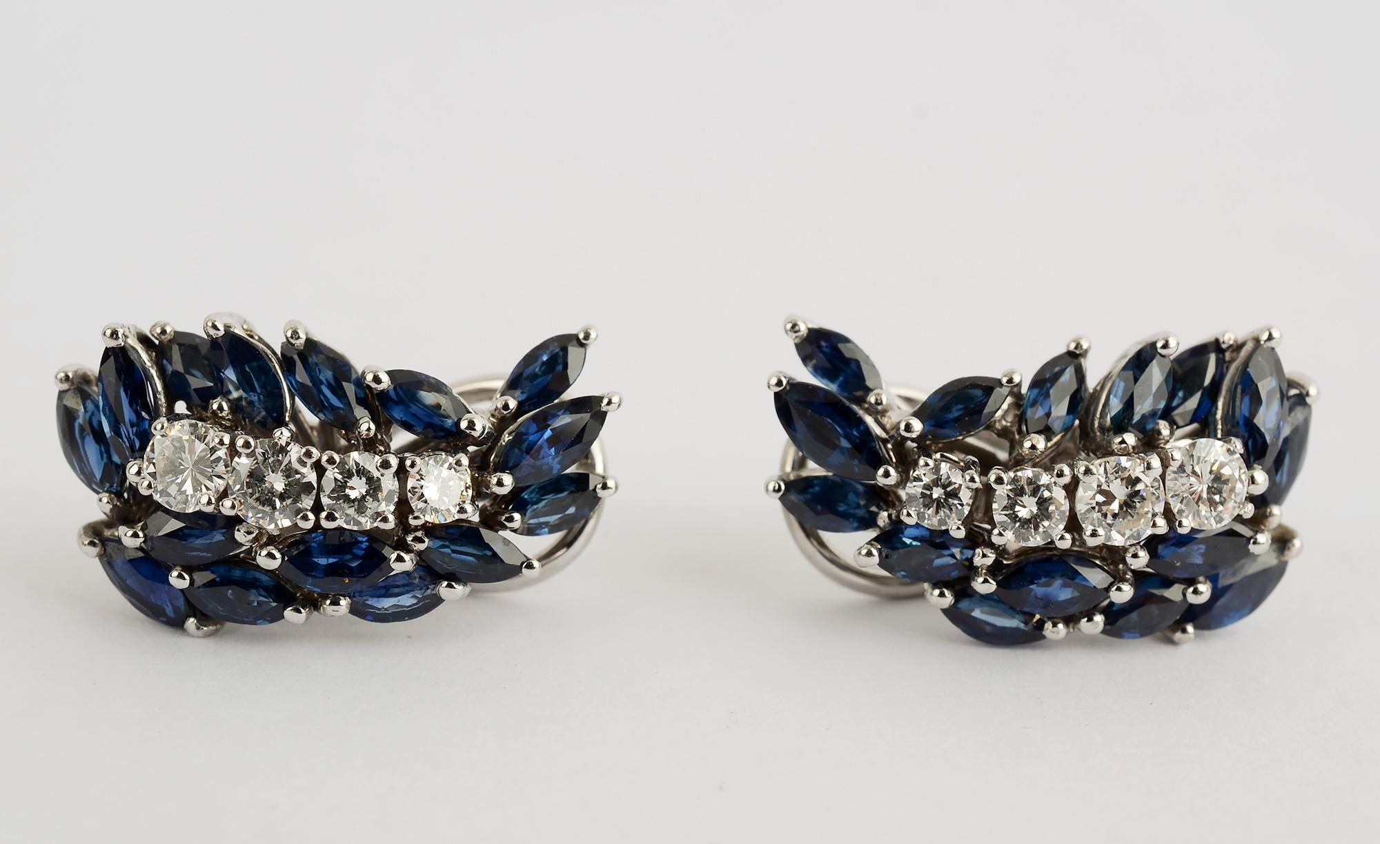 Elegant sapphire and diamond earrings set in 18 karat white gold. Each earring is centered with four diamonds of H color; VS quality and weighing approximately a total of half a carat. The sapphires are heat treated Ceylon stones.
The earrings have