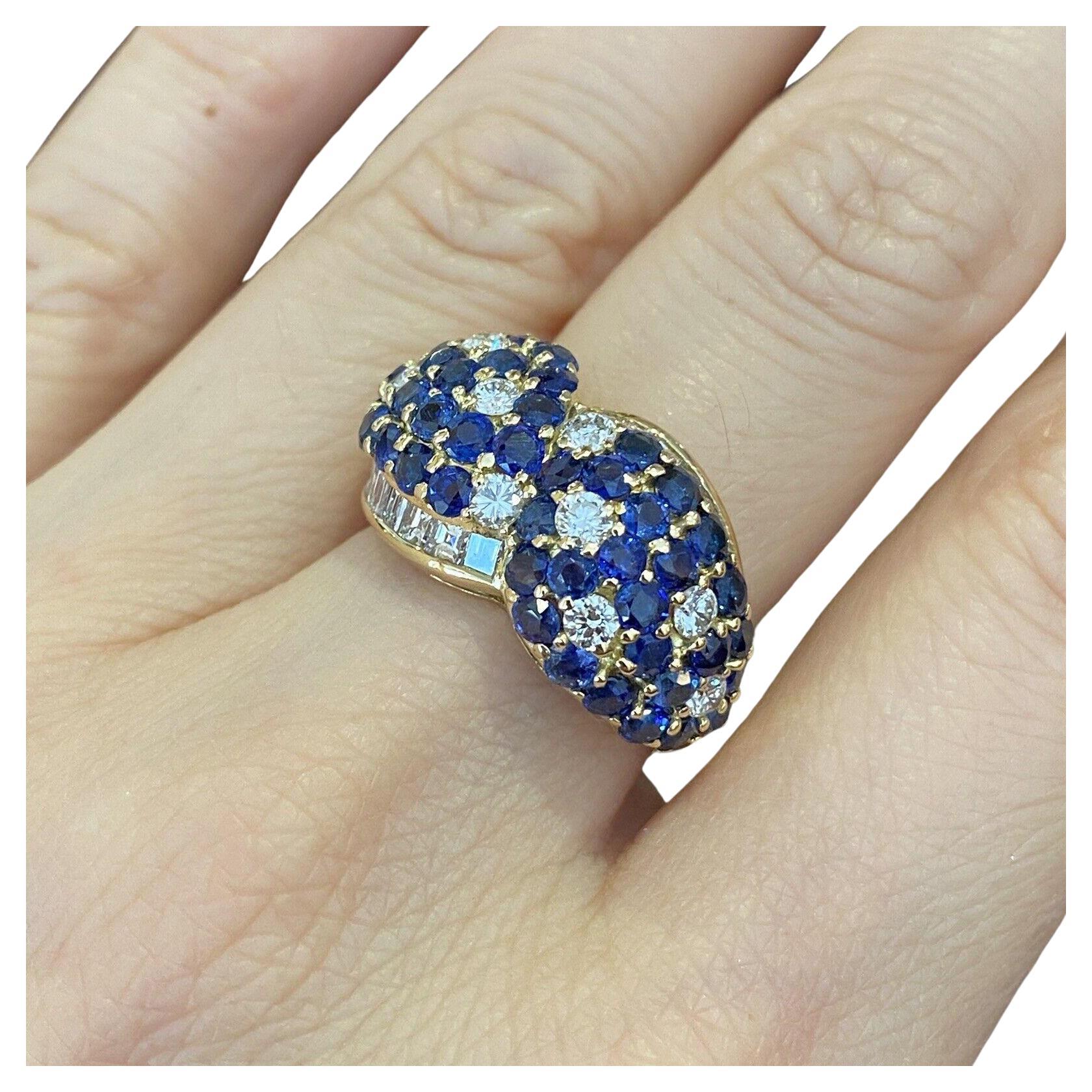 Sapphire and Diamond Wide Band Ring in 18k Yellow Gold

Sapphire and Diamond Wide Band Ring features 4.10 carats of Round Blue Sapphire and 1.47 carats of Round Brilliant cut Diamonds and Square Baguette Diamonds, all set in 18k Yellow Gold.

Total