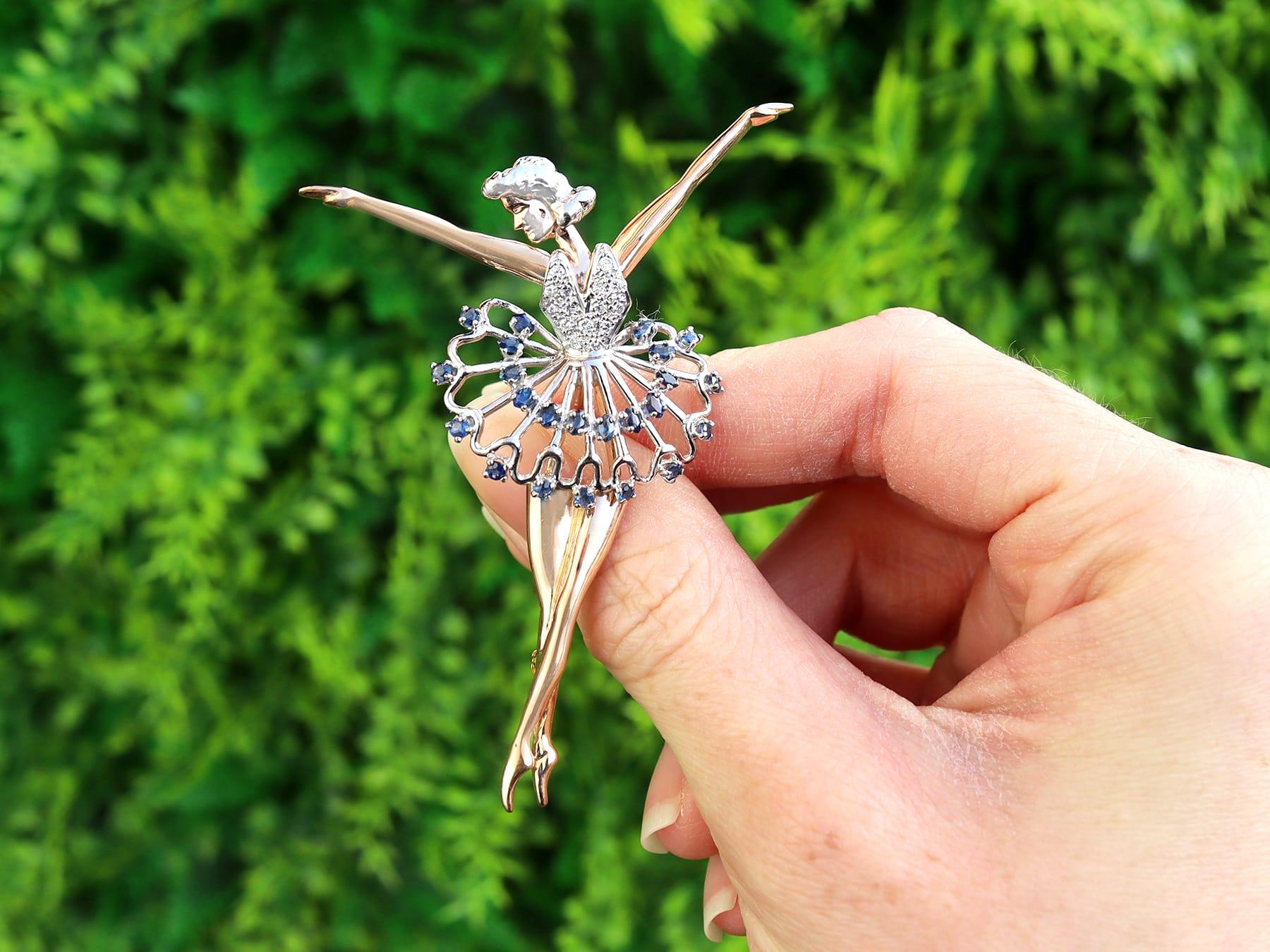 An impressive vintage 0.75 carat sapphire and 0.22 carat diamond, 18 karat yellow and white gold 'ballerina' brooch; part of our diverse antique jewelry and estate jewelry collections.

This fine and impressive vintage diamond brooch has been