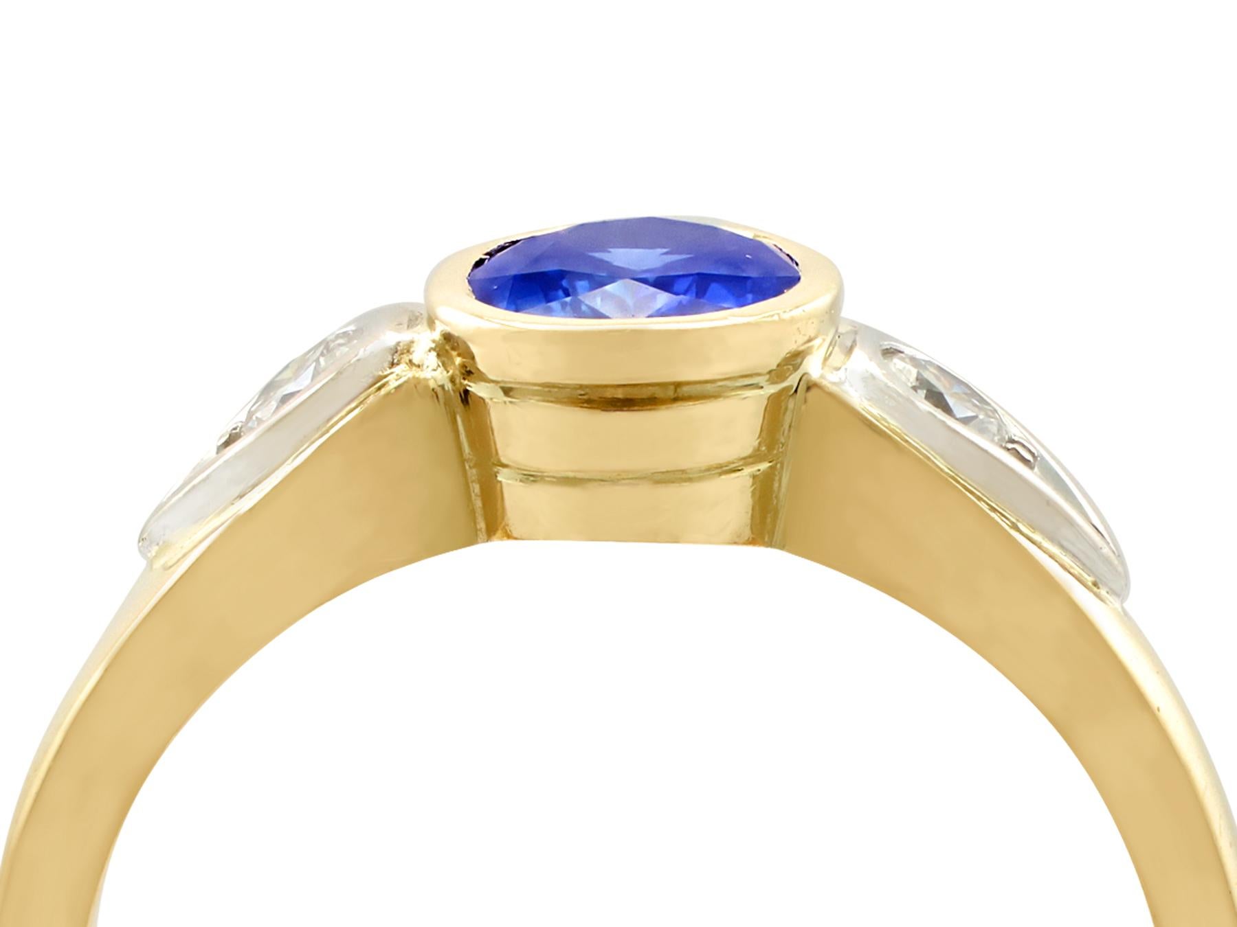 An impressive vintage 0.84 carat sapphire and 0.14 carat diamond, 18 karat yellow and white gold dress ring; part of our diverse antique jewellery and estate jewelry collections

This fine and impressive vintage sapphire ring has been crafted in 18k