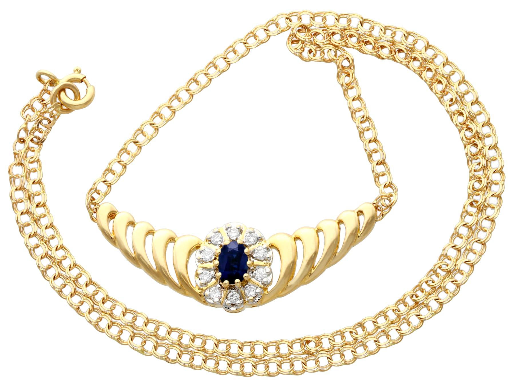 A fine and impressive 0.36 carat blue sapphire and 0.45 carat diamond, 18 karat yellow gold necklace; part of our contemporary and estate jewelry collections

This fine contemporary sapphire and diamond necklace has been crafted in 18k yellow