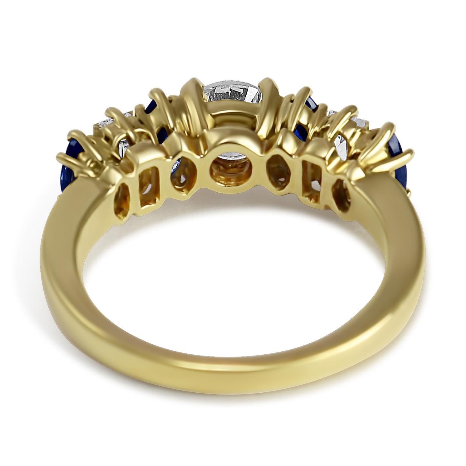 Marquise Cut Sapphire and Diamond Yellow Gold Ring For Sale
