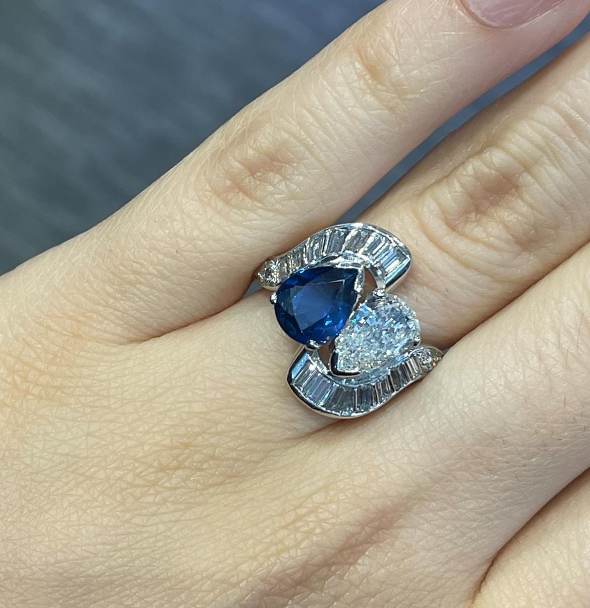 Sapphire and Diamond You & Me ring

A ring set with a pear-shaped diamond and sapphire accented by baguette-cut diamonds. 

Approximate Sapphire Weight: 1.61 carats
Approximate Diamond Weight: 1.49 carats
Ring Size: 7.25
Resizable free of