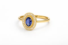 Sapphire and diamonds 14k gold ring.
