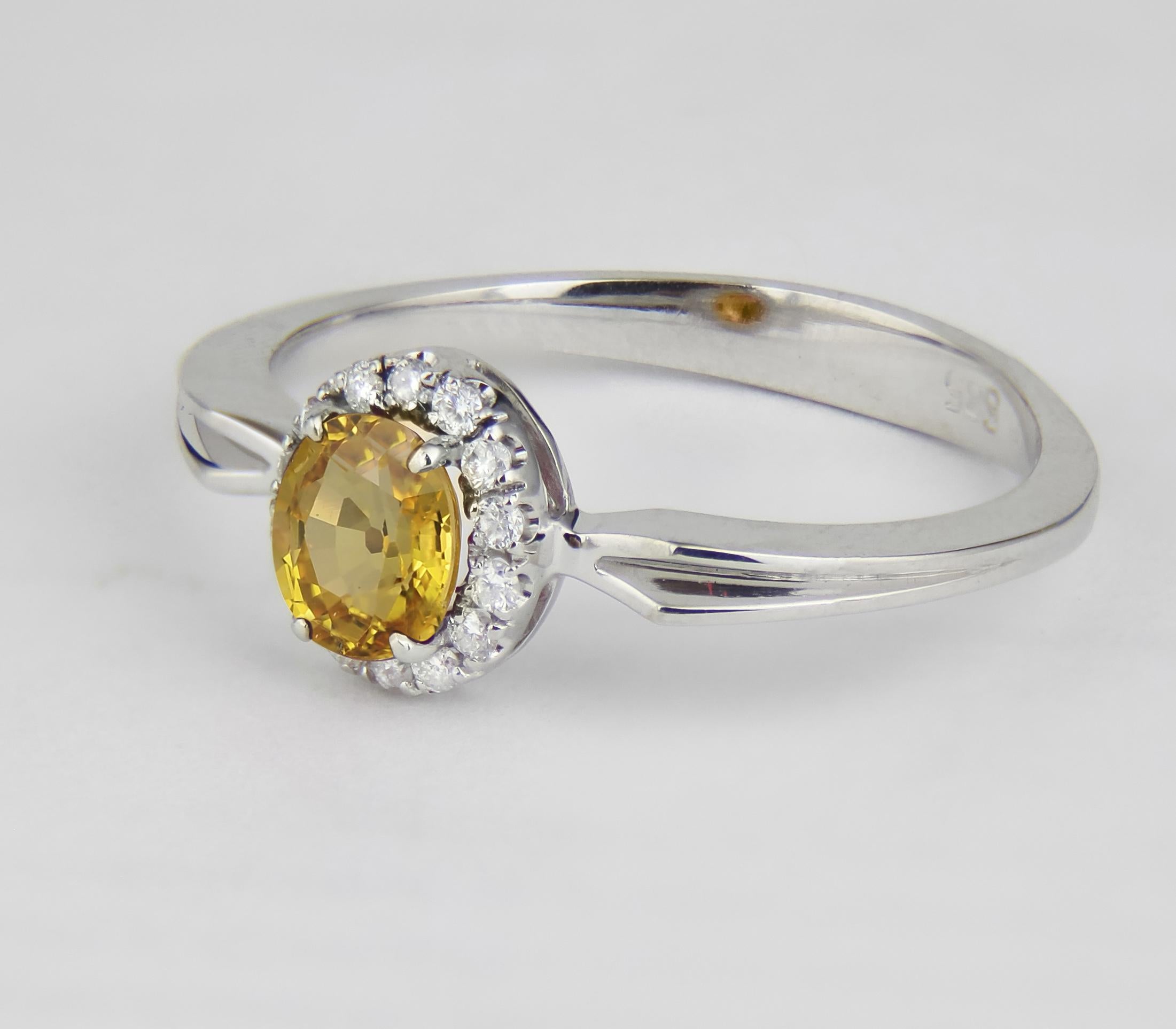 Ring aus 14-karätigem Gold mit Saphiren und Diamanten.  im Angebot 1