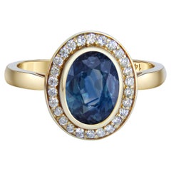 Sapphire and diamonds 14k gold ring.