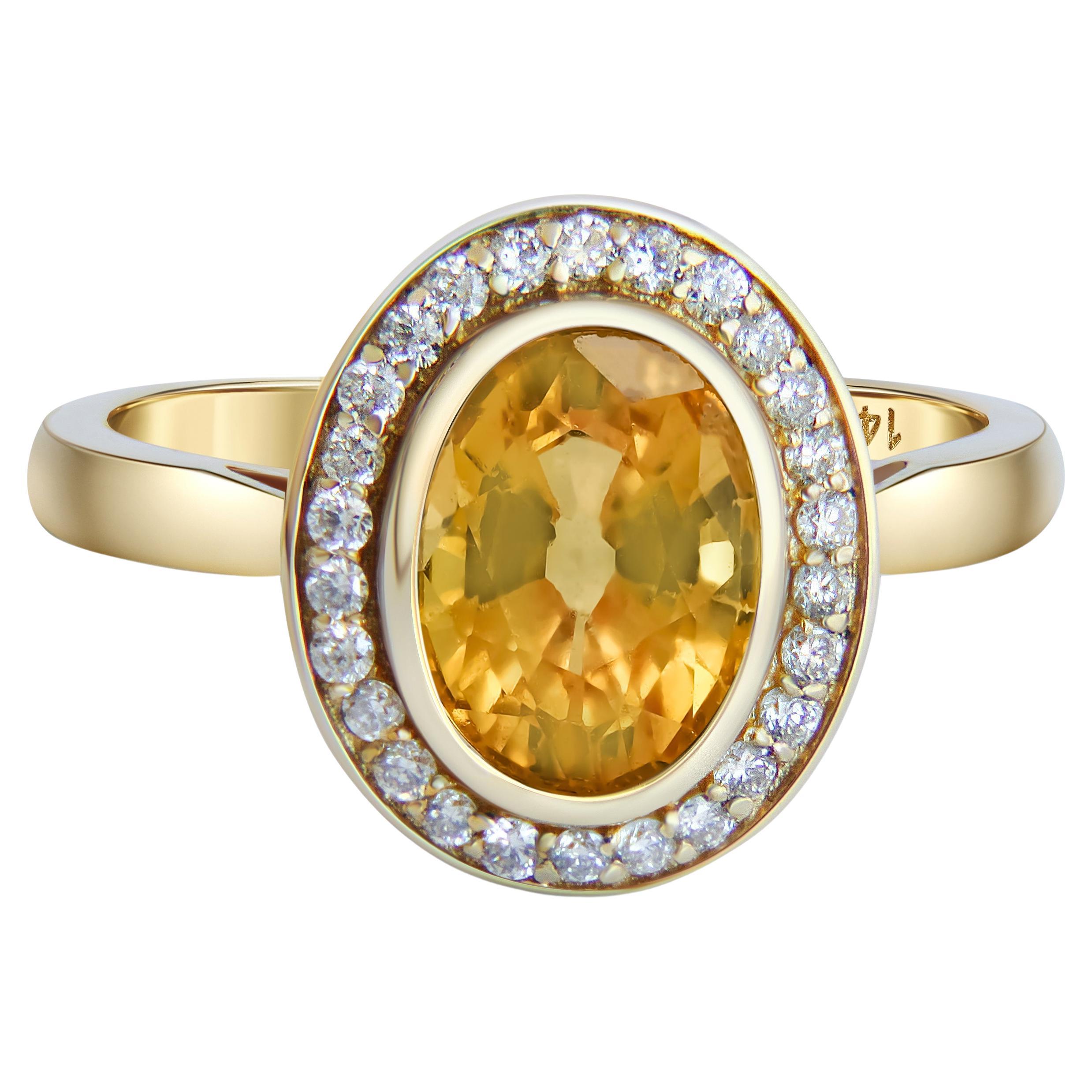 Bague en or 14k avec saphir et diamants. 