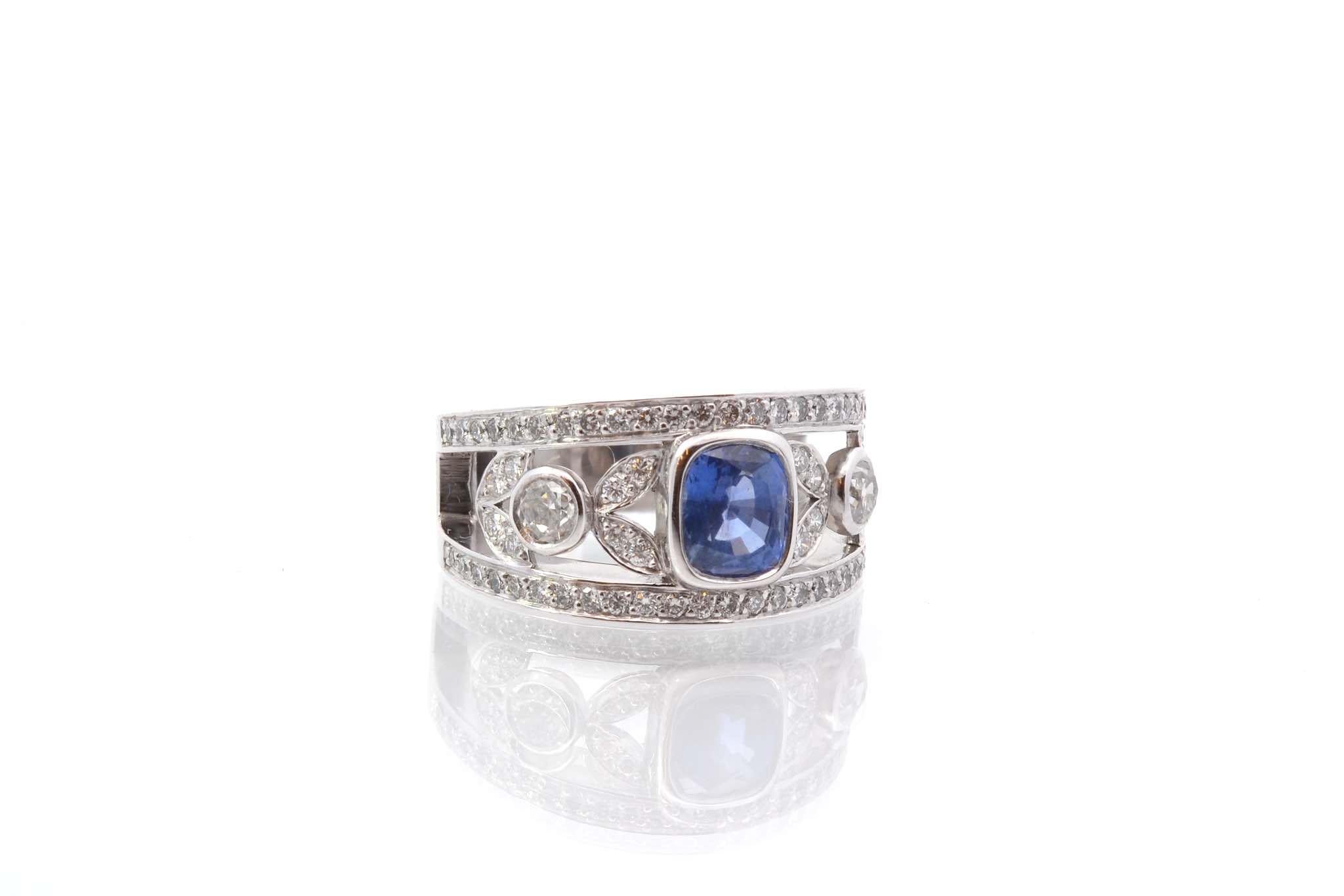 Oval Cut Sapphire and diamonds band ring in platinum For Sale