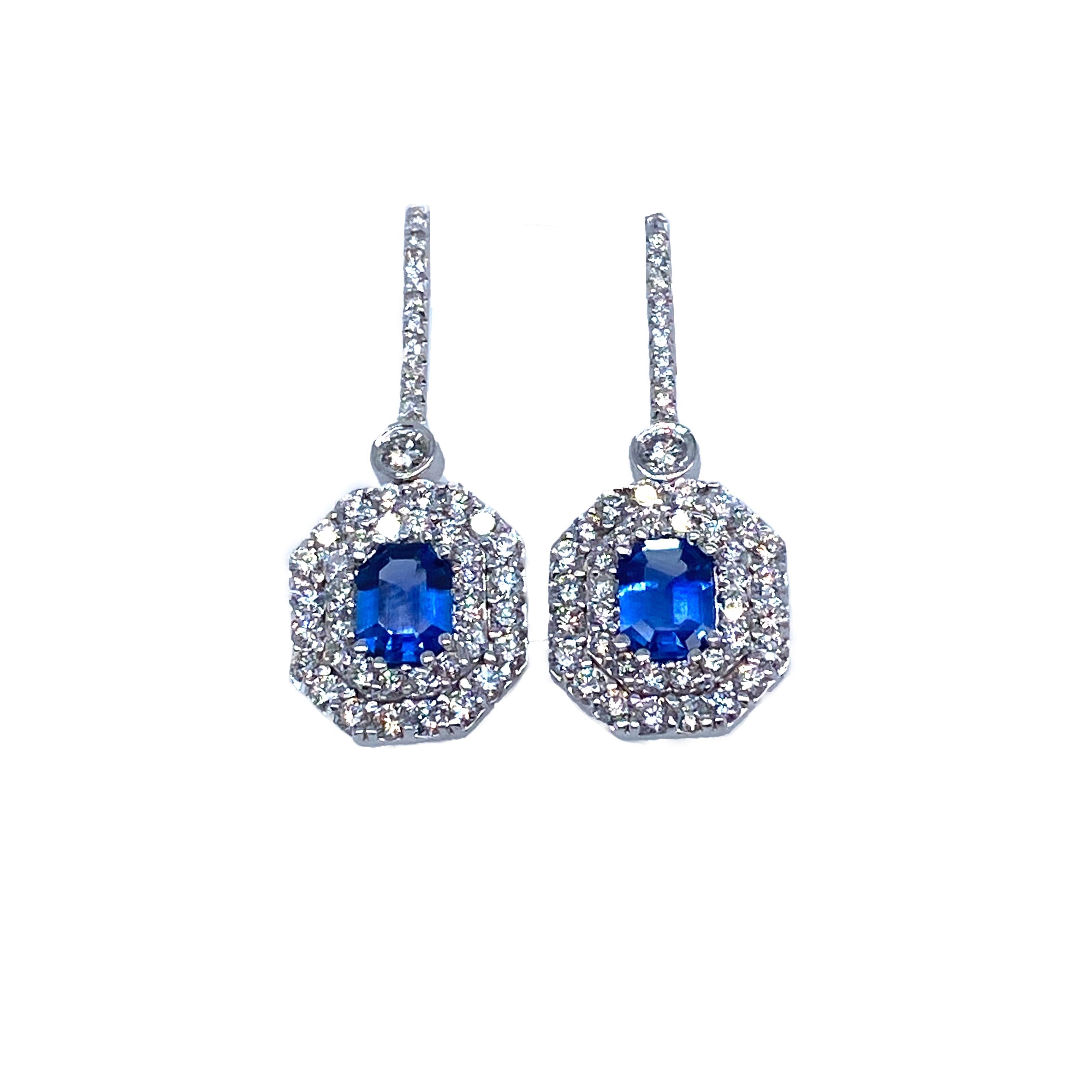 Offered here is a classic look sapphire & diamonds earring set in 18kt white gold. The earrings measure about 1.25” long and about 0.50” on the widest part. The earrings weigh 7.6 grams. The earrings are not marked, but tested with acid on black