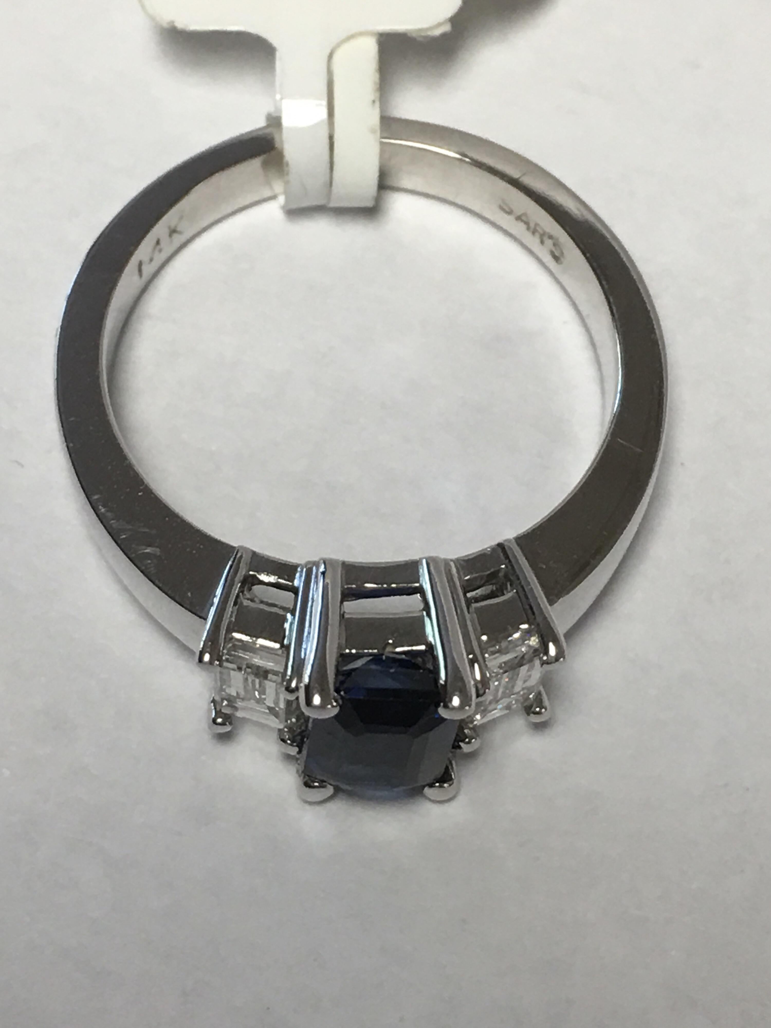 Emerald Cut Sapphire and Diamonds Ring