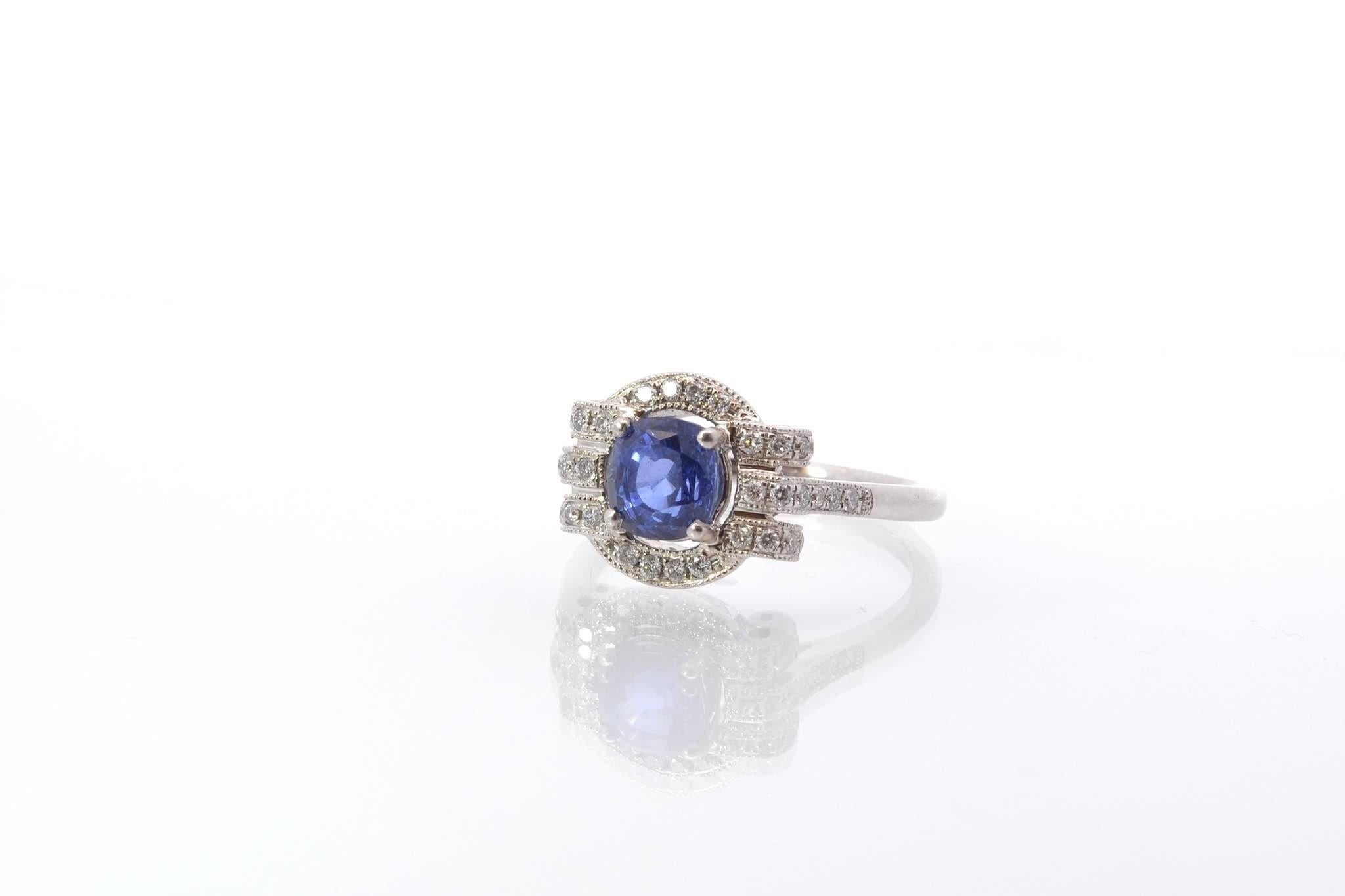 Round Cut Sapphire and diamonds ring in 18k gold