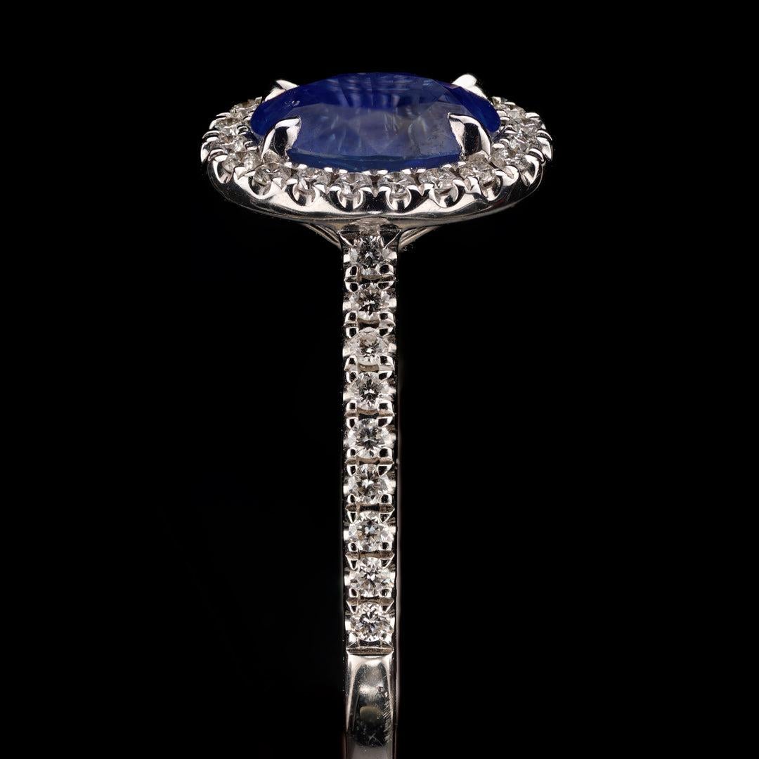Women's Sapphire and Diamonds Single Halo Ring For Sale