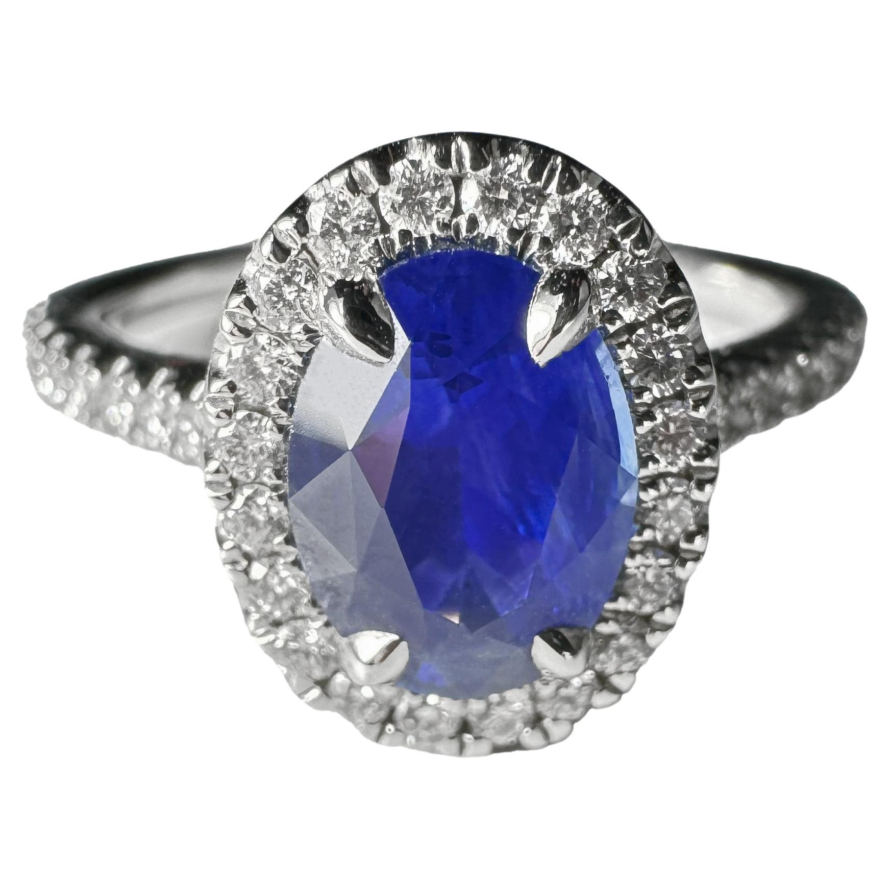 Sapphire and Diamonds Single Halo Ring For Sale