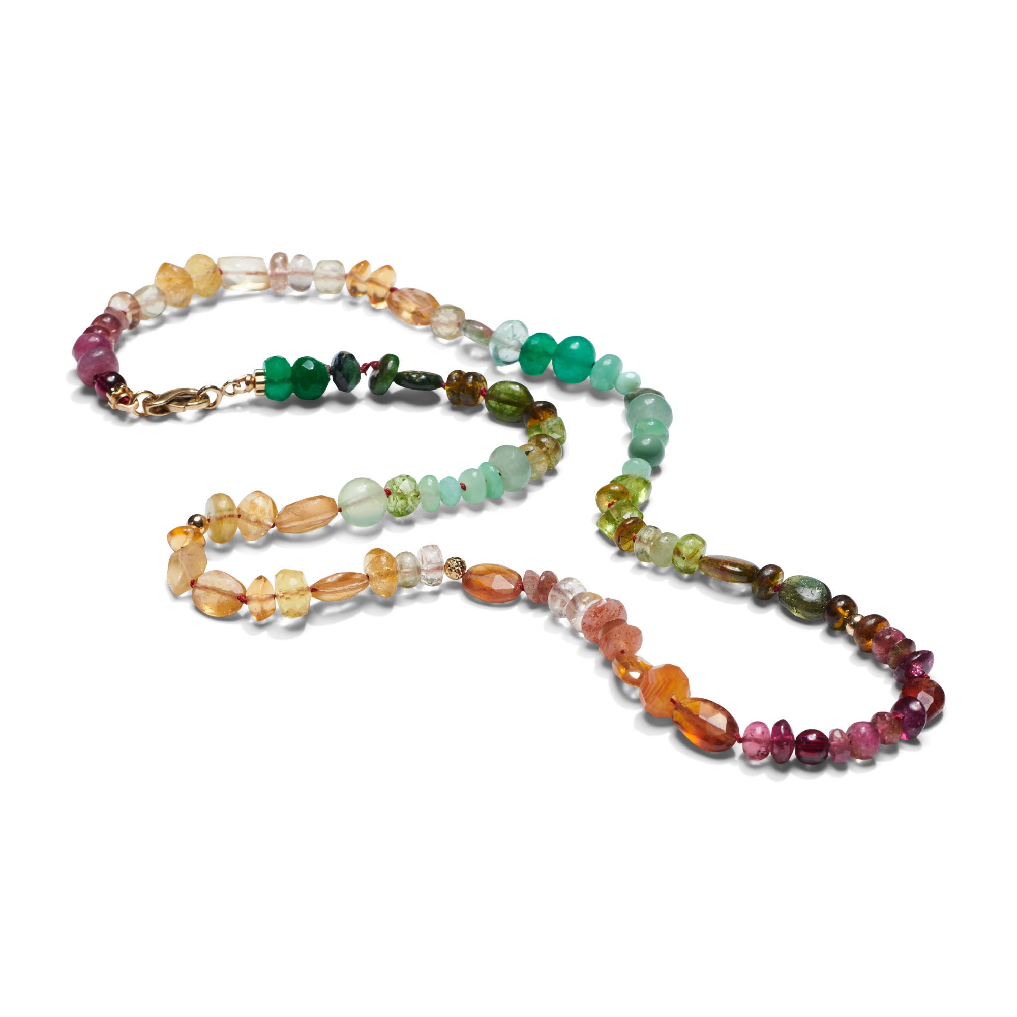 Collier en or jaune perlé de saphirs et d'émeraudes