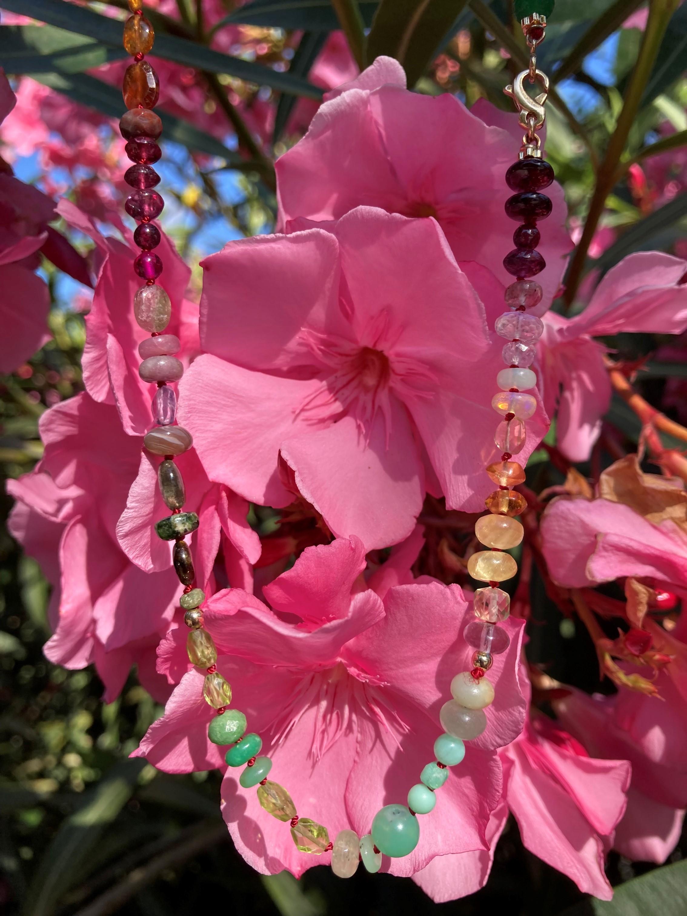 A sparkling unique 20 inch multi gemstone necklace, featured vibrand colours such as green, yellow and reds. The size can be customized, please ask us before placing your order.

This beauty contains facetted sparkling pure gemstones such as;

•