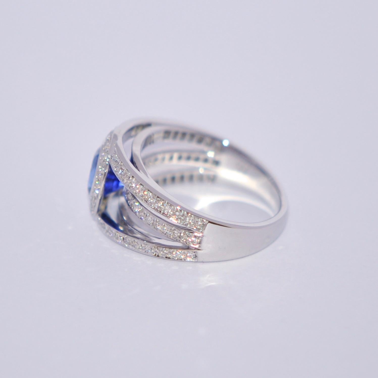 Oval Cut Sapphire and White Diamonds on White Gold 18 Karat Engagement Ring