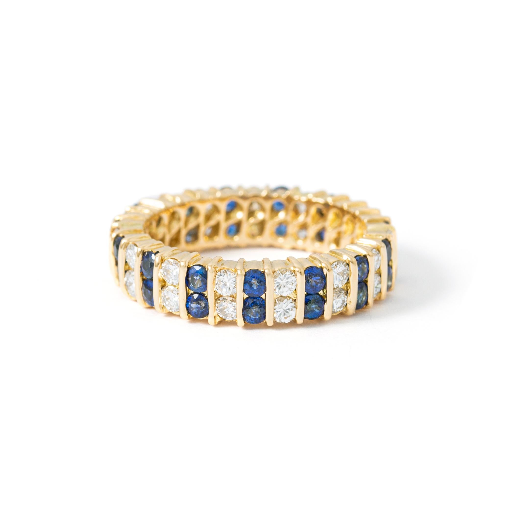 Ring in 18kt yellow gold set with diamonds 0.93 cts and sapphires 1.46 cts Size 50