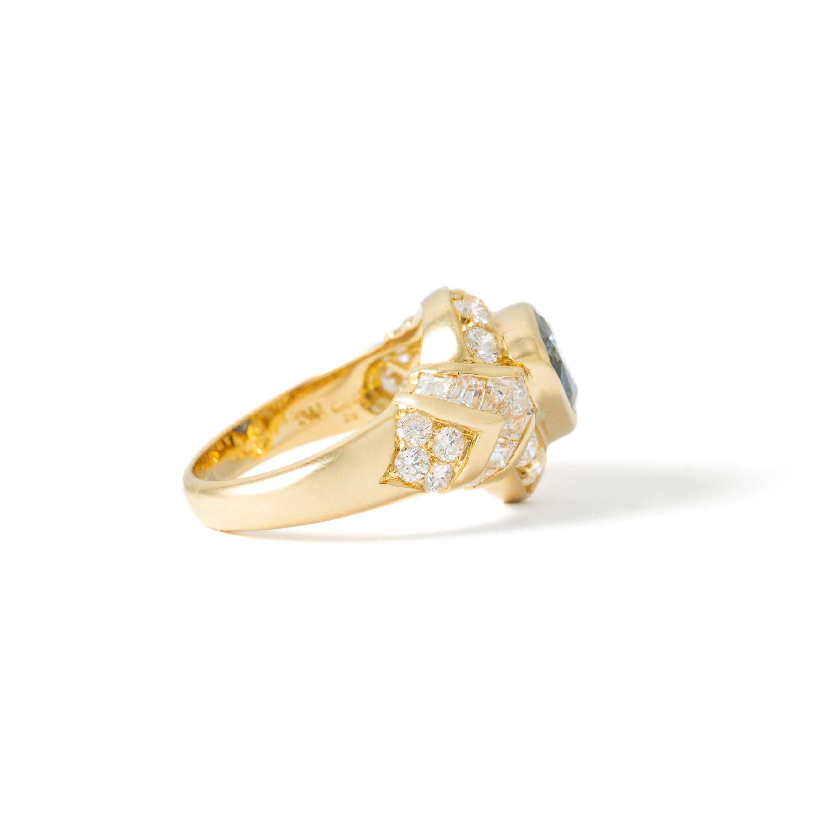 Contemporary Sapphire and Yellow Gold Diamond Ring For Sale