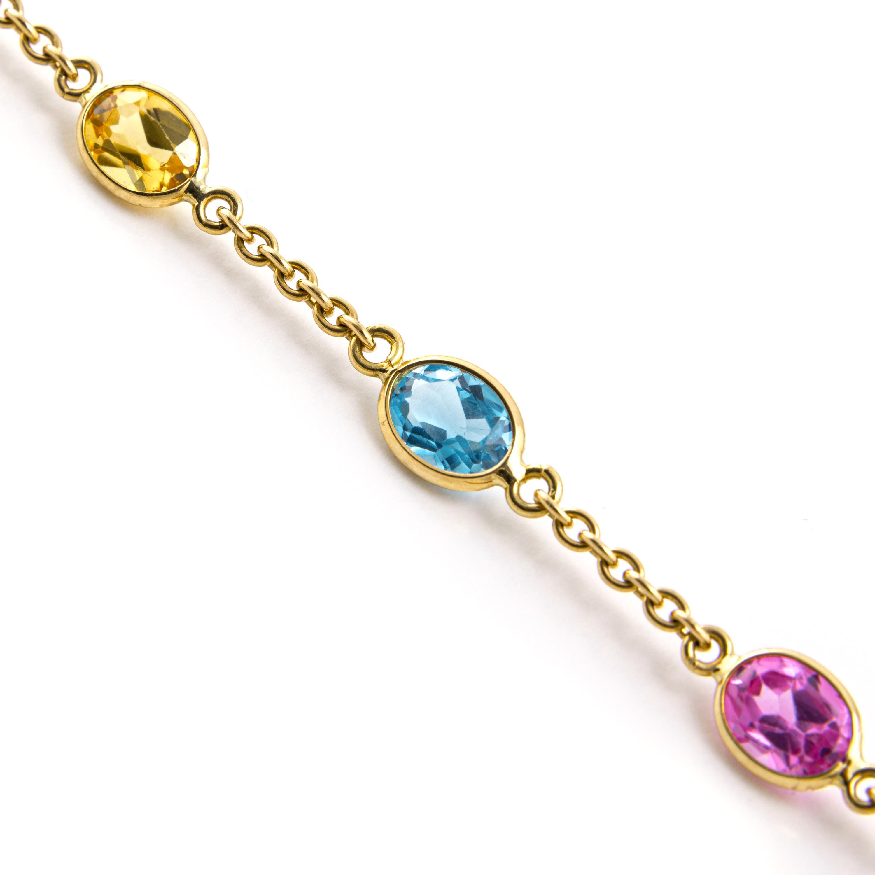 Colored GemStones yellow gold 18k chain Necklace.
Colored Sapphire, Aquamarine and Spinel.
Former collection of a French Lady.
Length: 16.53 inches (42.00 centimeters).
Total weight: 13.69 grams.

