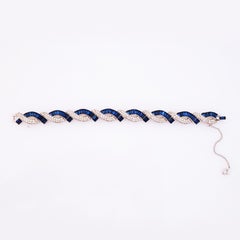 Bracelet cocktail en cristal baguette et saphirs par Crown Trifari, années 1950