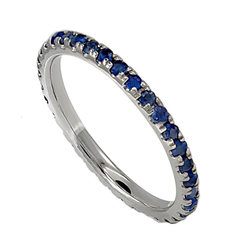 A dainty Sapphire band that contains approximately 0.90 carats of Sapphires. This chic ring can be worn single or stacked with the same or multiple colors for a fun accessory! The material of this ring is 18K gold.
