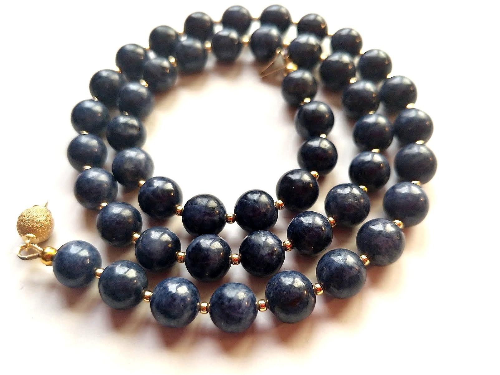 The length of the necklace is 19 inches (48 cm). The size of the smooth round beads is 8 mm.
Beads are not transparent, uniform, dark blue, blueberry color — soft matte shine. The color is authentic and natural. Genuine natural blue sapphire not