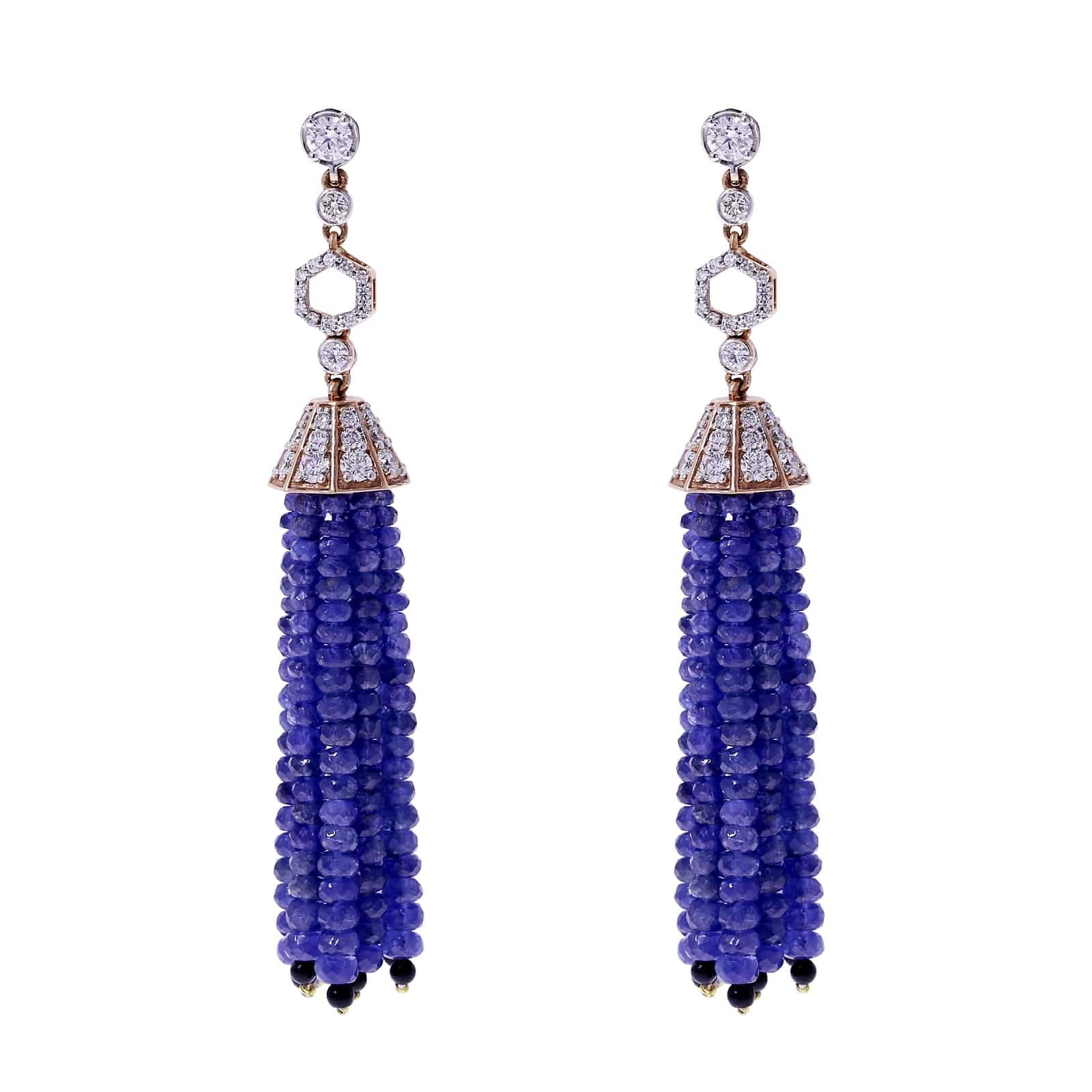 A beautiful work of art with Faceted Sapphire Bead Tassels with Diamonds and Onyx. There are 89.51 cts. of Sapphire, 1.64 cts of Onyx, and 3.33 cts of Diamonds The earrings weighs 28.29 grams.
