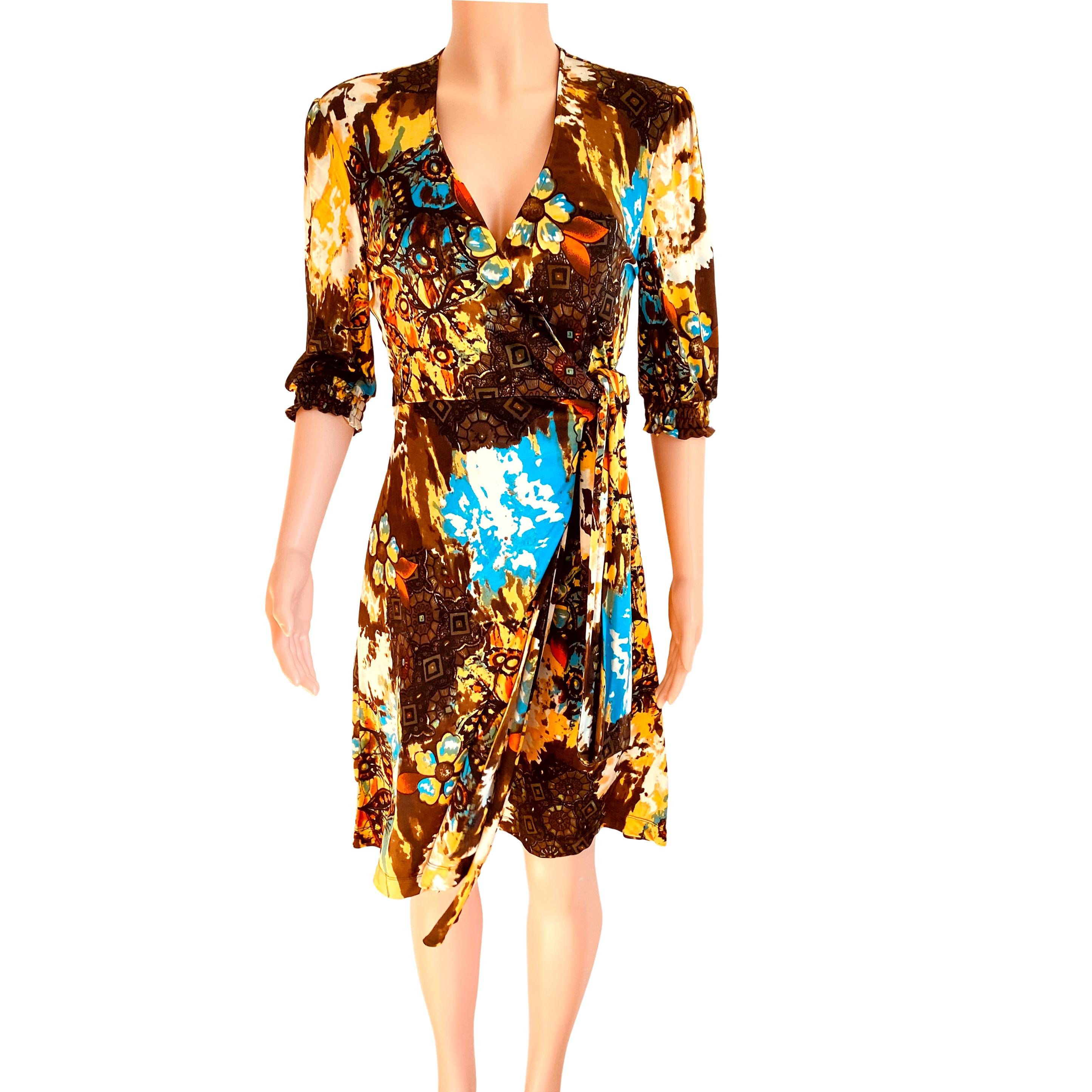 True wrap dress with A-line skirt and mid-length gentle puff sleeves. 
Print: Archaic print in yellow, brown, white and a touch of sky blue.
FLORA KUNG silk dresses are made in premiere quality, long-filament silk yarn which gives a natural