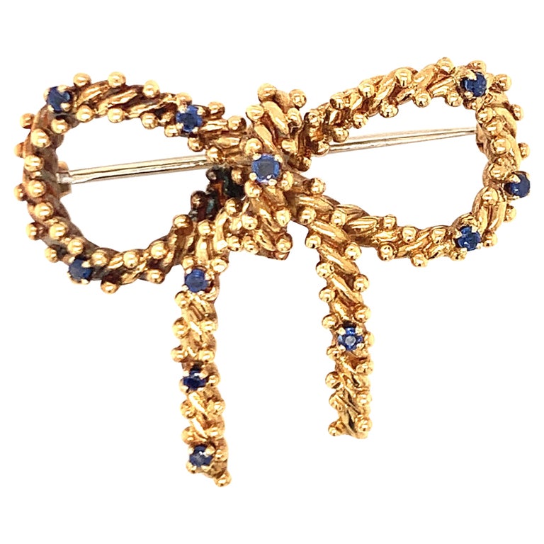 Sapphire Bow 18k Yellow Gold Brooch by Tiffany and circa