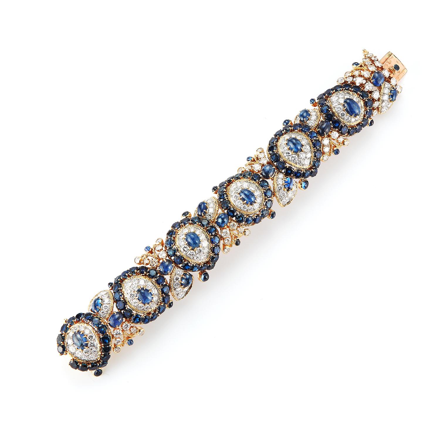 Magnificent Sapphire Bracelet by Van Cleef and Arpels, 
176 round cut diamonds, 96 round cut sapphires, 18 small cabochon sapphires & 18 large cabochon sapphires all set in 18K Yellow Gold.
Approx 25 carats of diamonds
Measurements: 7.25