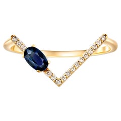 Anillo de oro de 14k con zafiro chevron.
