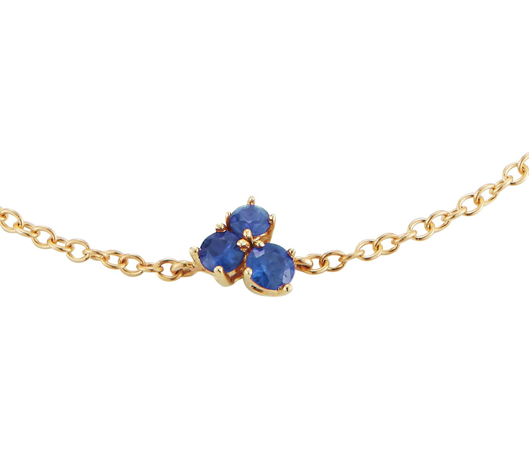 A playful but still classic version of a solitaire bracelet with beautiful sapphires. 

18k yellow gold 
0.14 cts total 
6mm across, at the widest point 
complimentary domestic ground shipping 