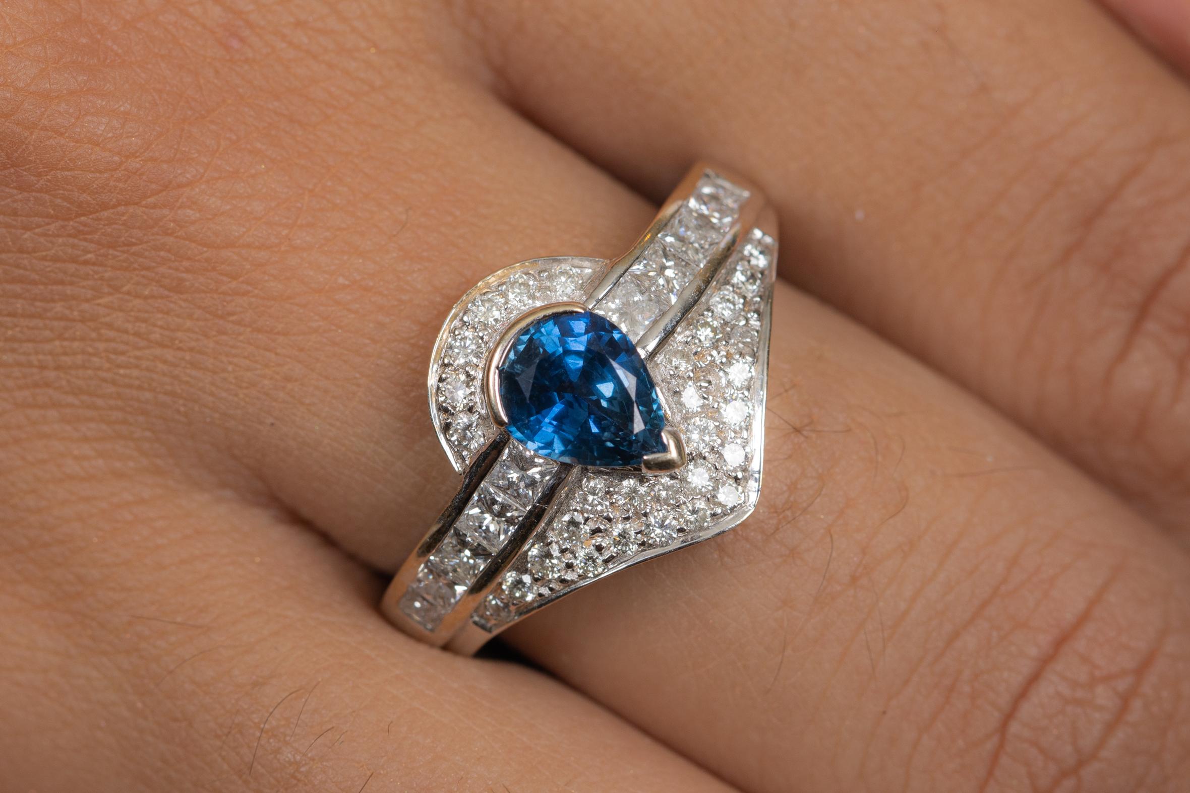 Blue Sapphire Statement Ring with Diamonds in 18K Gold featuring natural sapphire of 1.55 carats and diamonds of 1.25 carats. The gorgeous handcrafted ring goes with every style.
Sapphire stimulate concentration and reduces stress.
Designed with