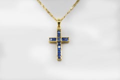 Sapphire cross 18 k gold