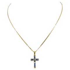 Sapphire cross 18 k gold