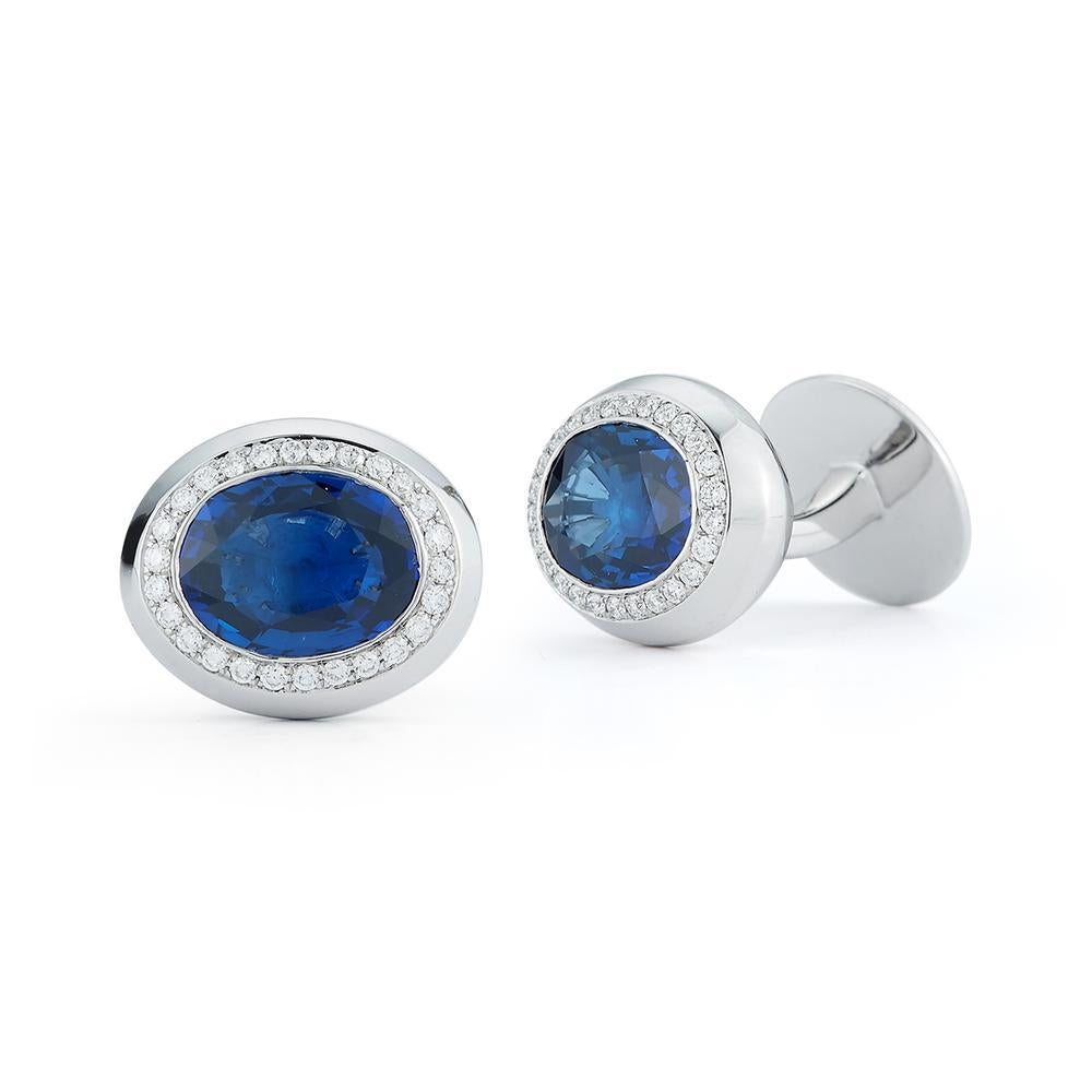 SAPPHIRE CUFFLINKS
Bright blue sapphires and a subtle diamond halo make for a
sophisticated touch.
Item: # 02764
Metal: 18k W
Color Weight: 4.33 ct.
Diamond Weight: 0.50 ct.