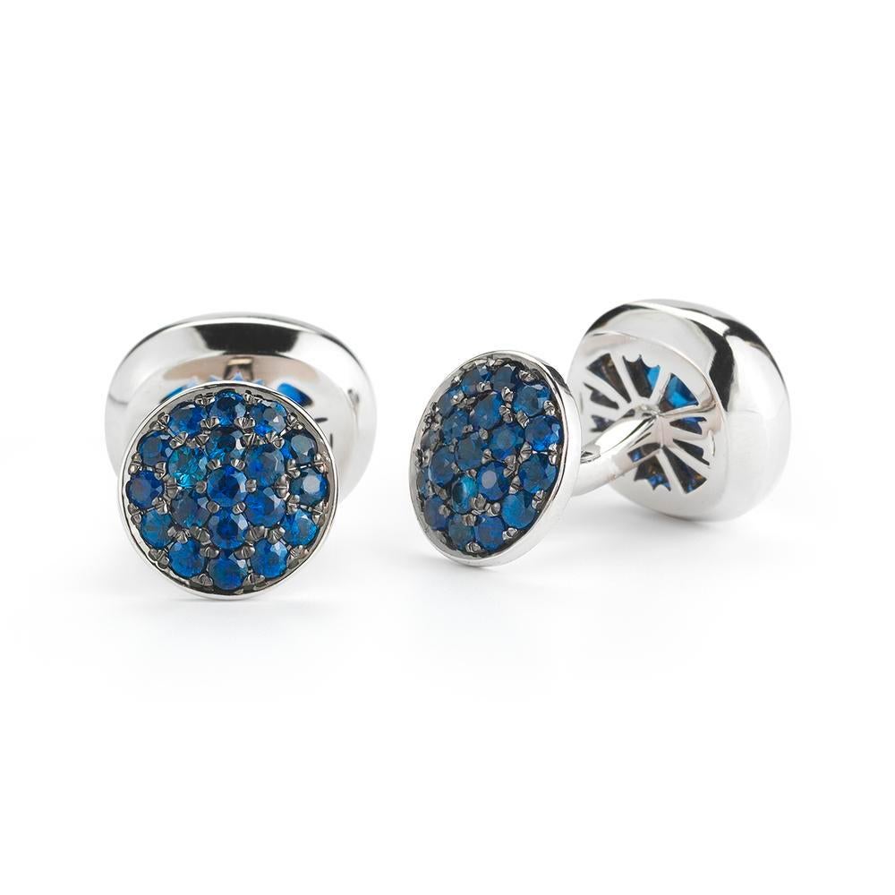 SAPPHIRE CUFFLINKS
A sleek profile features sapphire pavÃ© on one side and a single
luscious sapphire on the other.
Item: # 02763
Metal: 18k W
Color Weight: 5.18 ct.
Diamond Weight: 1.38 ct.